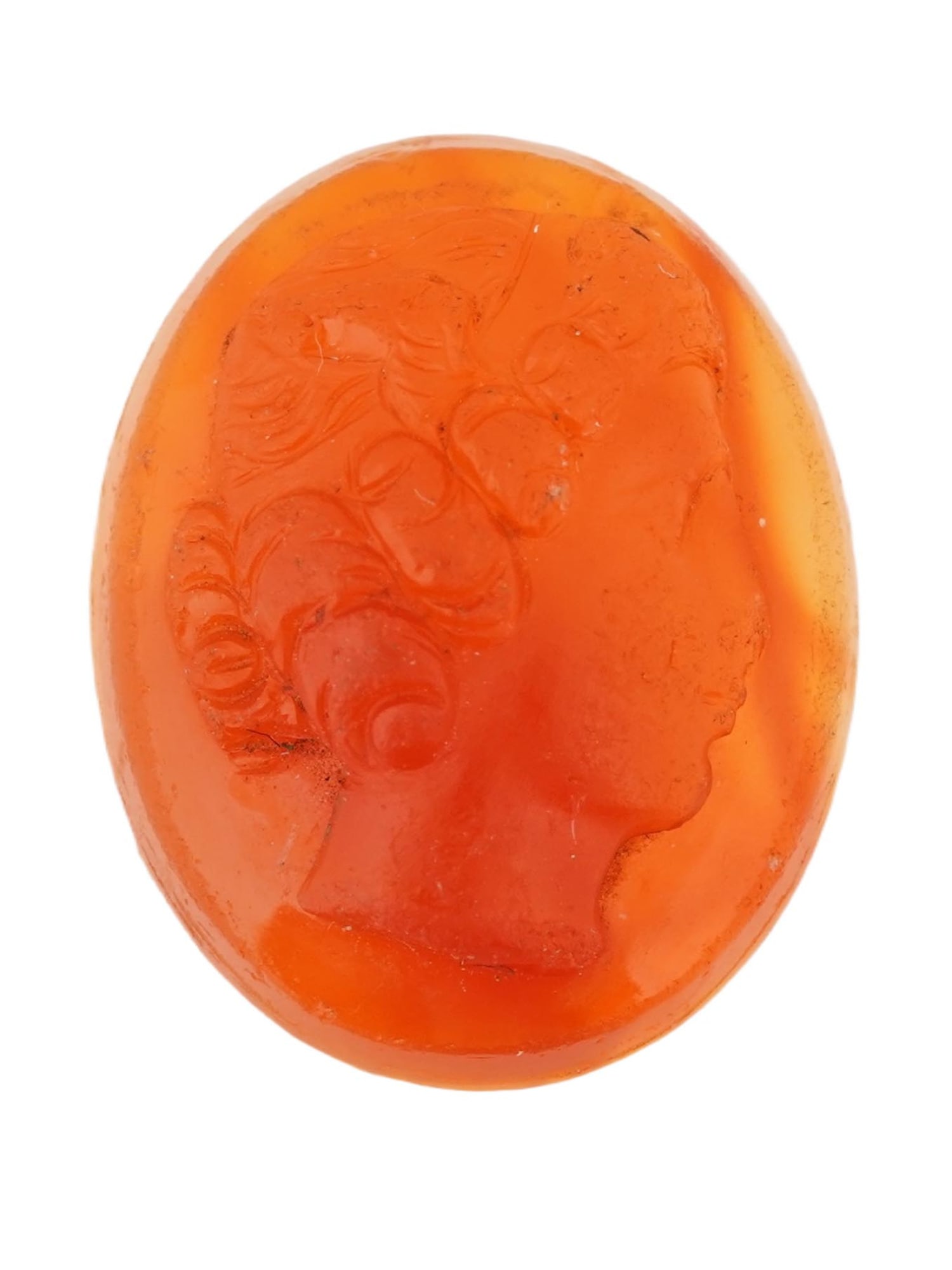HAND CARVED CARNELIAN CAMEO WITH FEMALE PROFILE: A hand carved carnelian stone cameo engraved with a female profile portrait. Oval in shape. The reverse side is flat. Antique And Vintage Intaglios, Cameos And Jewelry Collectibles. THIS LOT IS ELIGIB