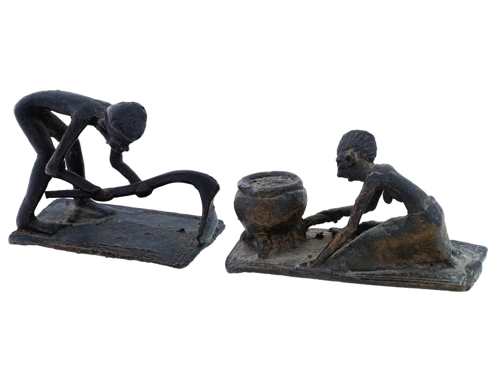 PRIMITIVE MANNER WORKER LOST WAX CAST BRONZE FIGURES: A lot of two vintage lost wax patinated bronze sculptures made in the Primitive manner. The sculptures depict male and female figures of workers. Each is mounted on a rectangular shaped base. Unmarked