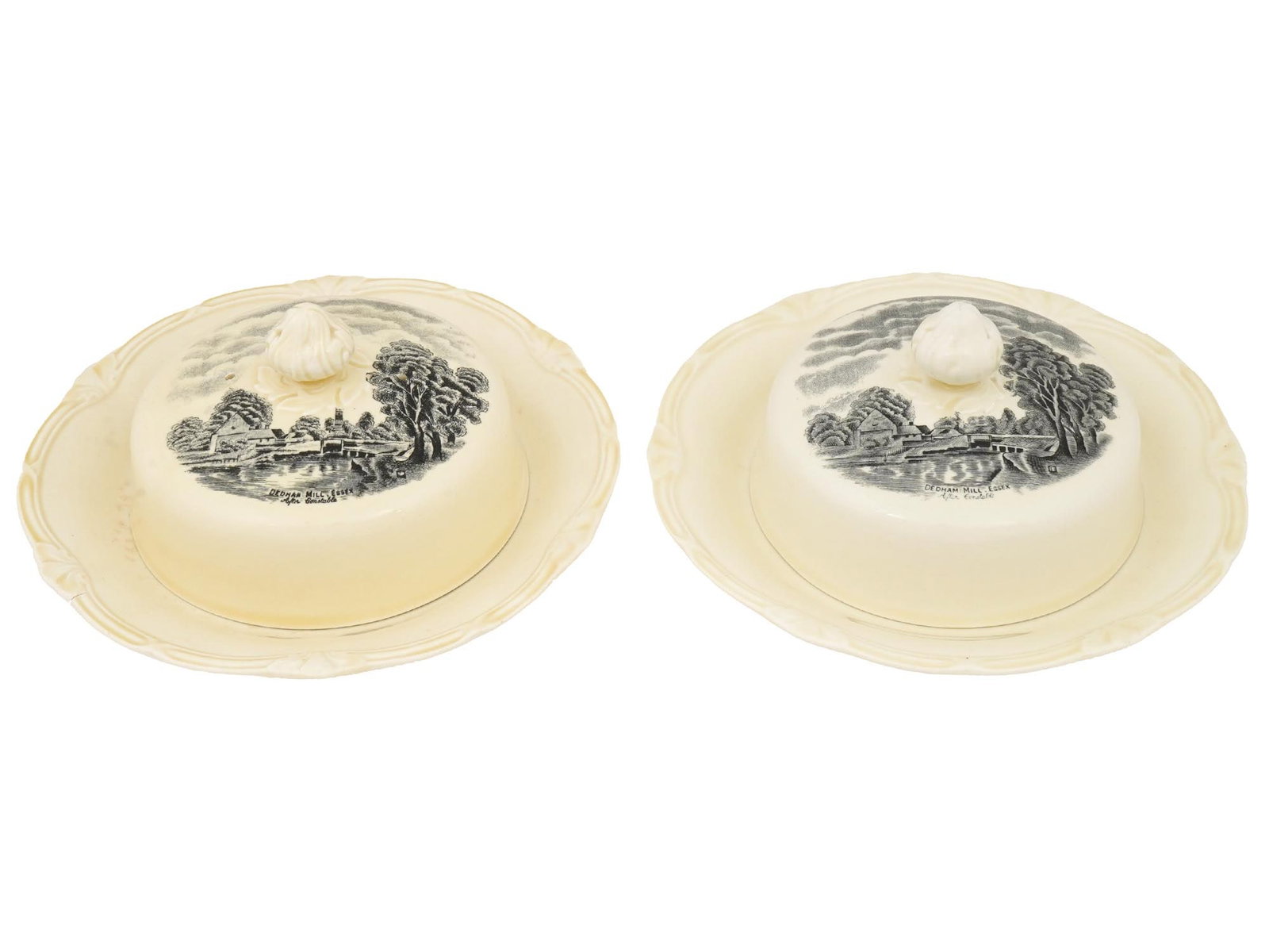 ENGLISH GRINDLEY CERAMIC BUTTER OR CHEESE DISHES: A pair of vintage English Staffordshire ceramic butter or cheese dishes by Grindley. The lot includes two identical dishes with a lid with a figured handle. Each lid depicts a landscape based on a Joh