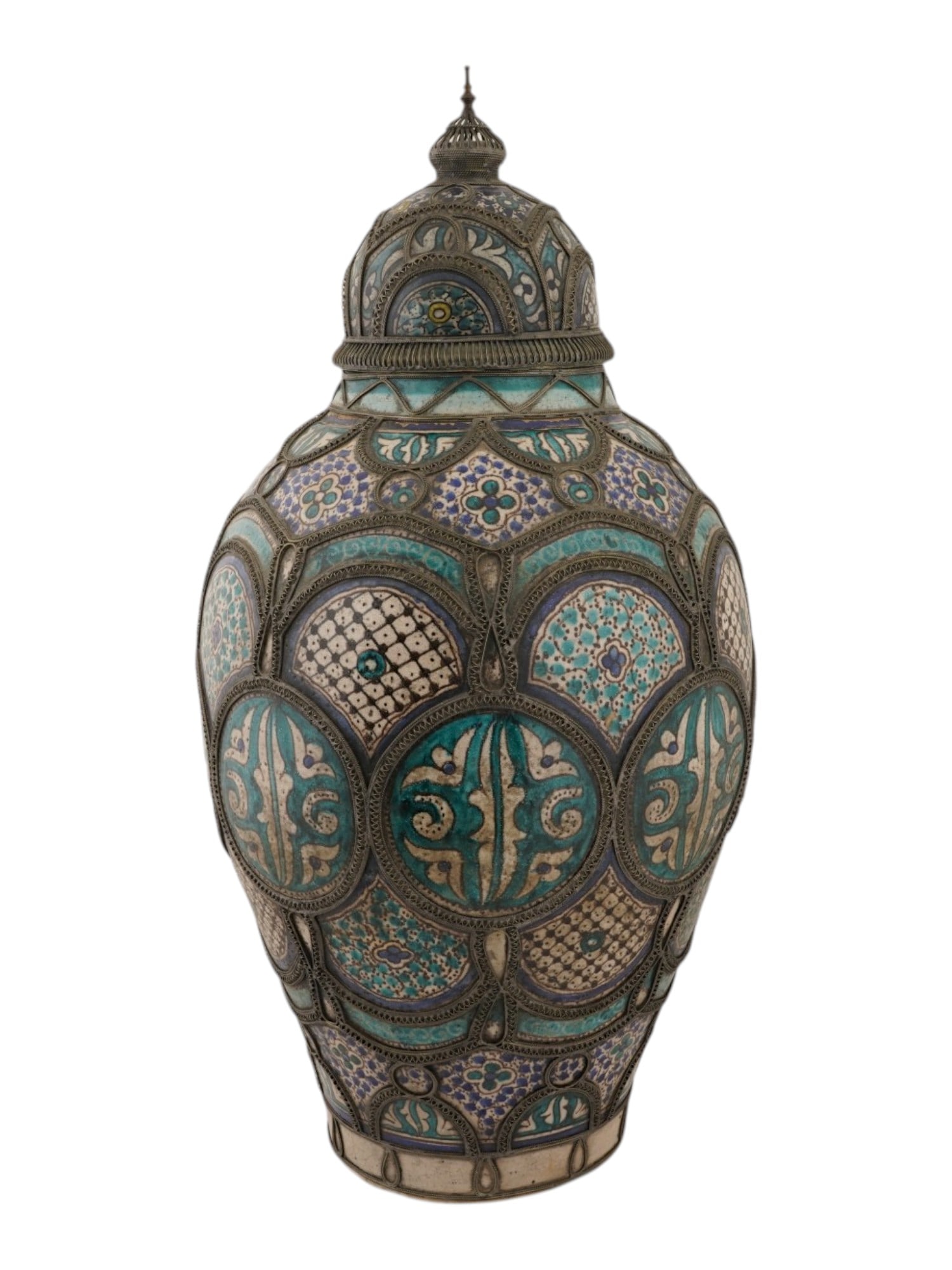 ANTIQUE MOROCCAN LIDDED POLYCHROME MAJOLICA POTTERY JAR: A monumental antique Moroccan lidded pottery jar, hand-crafted with vibrant polychrome majolica glazes and intricate brass and nickel-silver filigree overlay. The baluster-form vessel is decorated