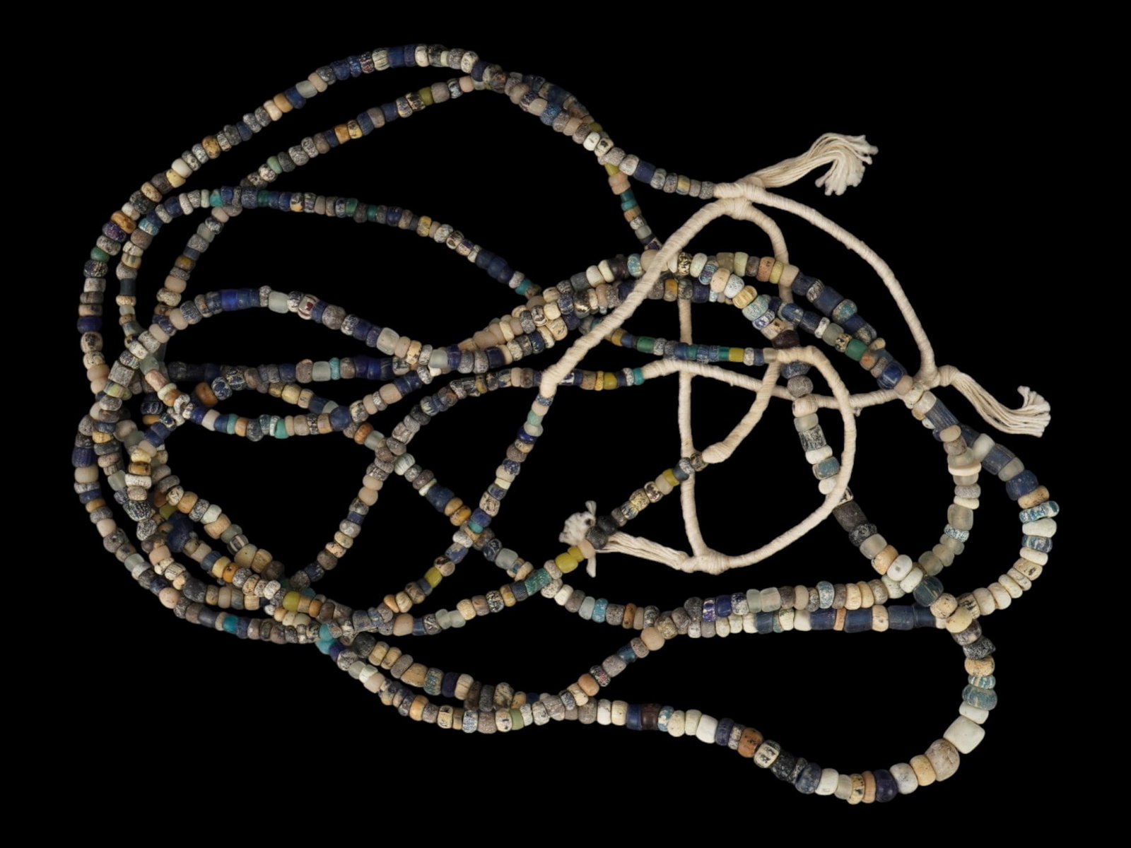 LOT OF ANCIENT ROMAN EMPIRE GLASS BEADED NECKLACES: A lot of three Ancient Roman glass beaded necklaces. Imperial era, dated ca. 100 to 300 AD. Historical Relics And Archaeological Finds, Pottery And Ceramics, Glassware. THIS LOT IS ELIGIBLE FOR A 30-D