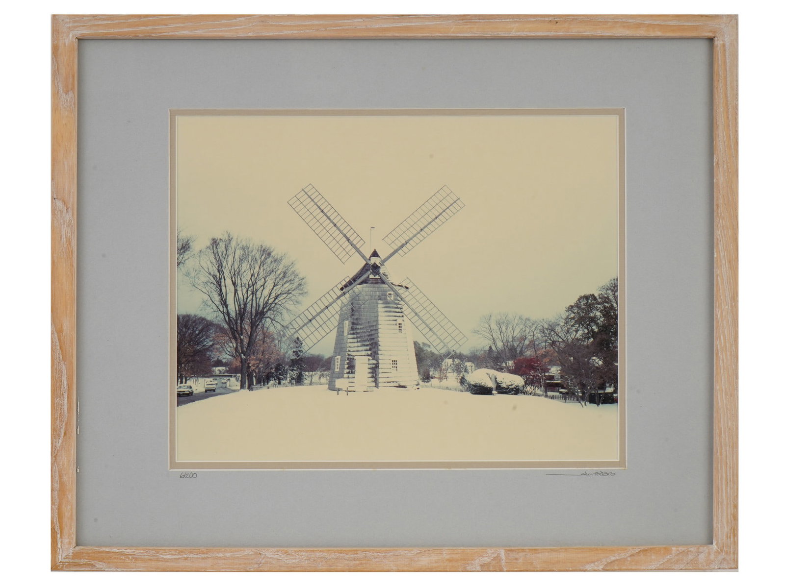 JOHN TODARO LIMITED EDITION EAST HAMPTON PHOTOGRAPH: John Todaro, American, 20th century, color photo print. Snow-covered Hook Mill in East Hampton, New York. Signed lower right. Numbered 6 out of 200 lower left. Framed. Copyright stamp on the backside.