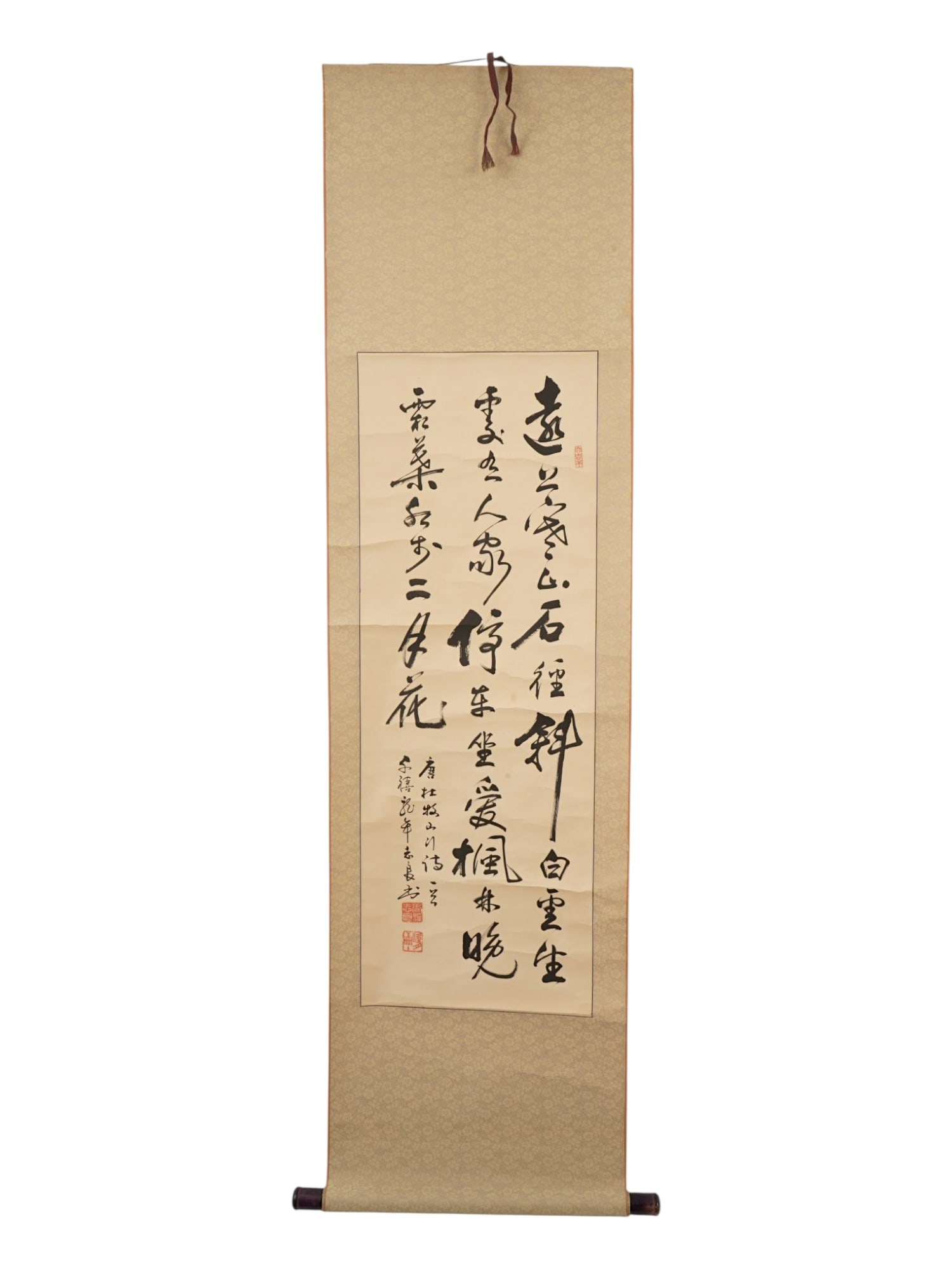 ANTIQUE CHINESE CALLIGRAPHY SCROLL PAINTING: An antique Chinese calligraphic artwork, ink painting on paper. Circa early 20th century. Poetic inscription in cursive script. Artists signature and red seal lower left. Wooden bars with suspension. 