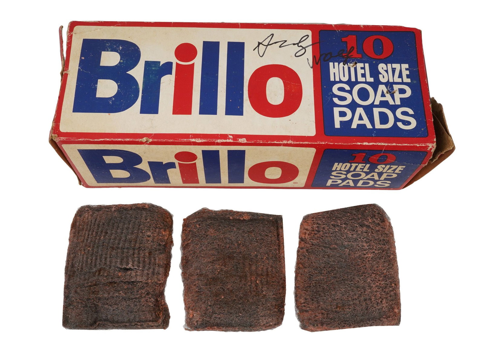 SIGNED ANDY WARHOL VINTAGE BRILLO SOAP PAD BOX: A vintage American pack of Brillo Hotel Size soap pads, designed for cleaning kitchen equipment in restaurants and institutions. Signed in black ink across the upper front panel Andy Warhol, American 