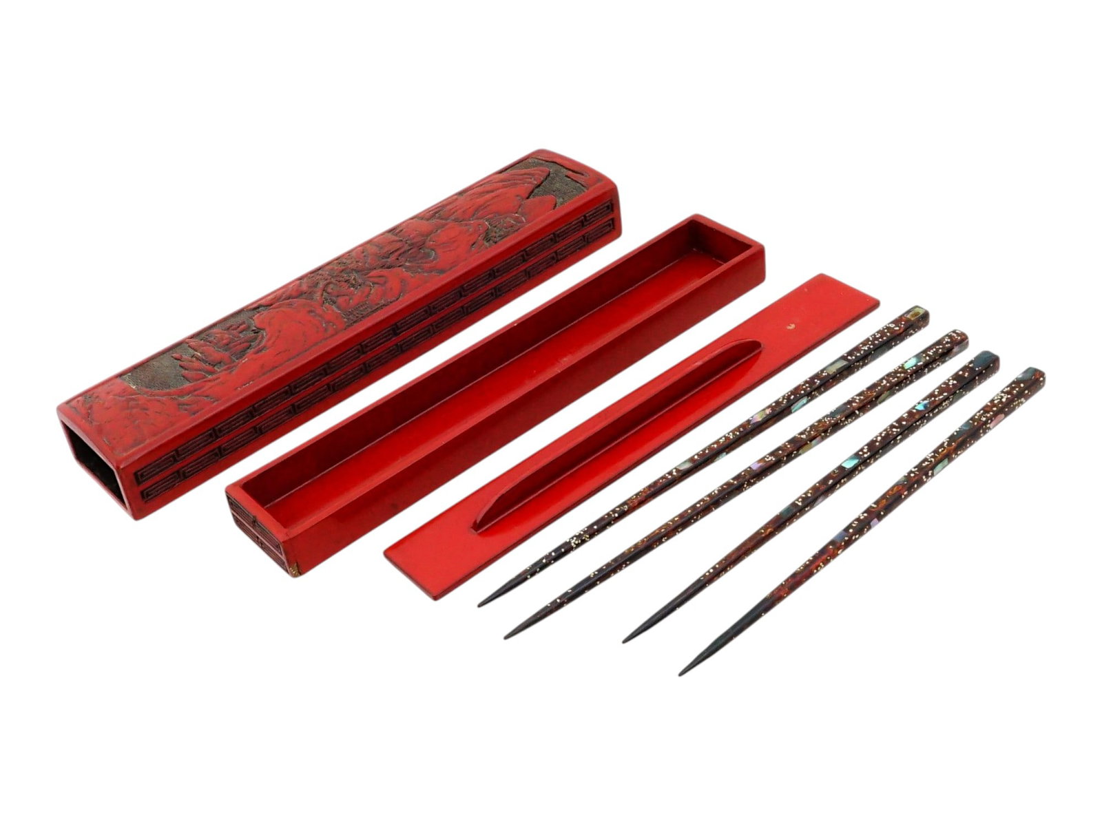 JAPANESE WAKASA NURI CHOPSTICKS WITH CINNABAR CASE: A lot of two pairs of Japanese Wakasa-nuri chopsticks in a fine detailed cinnabar case. The elegantly designed sticks are made of wood and encrusted with mother of pearl. Red smooth lacquered interior