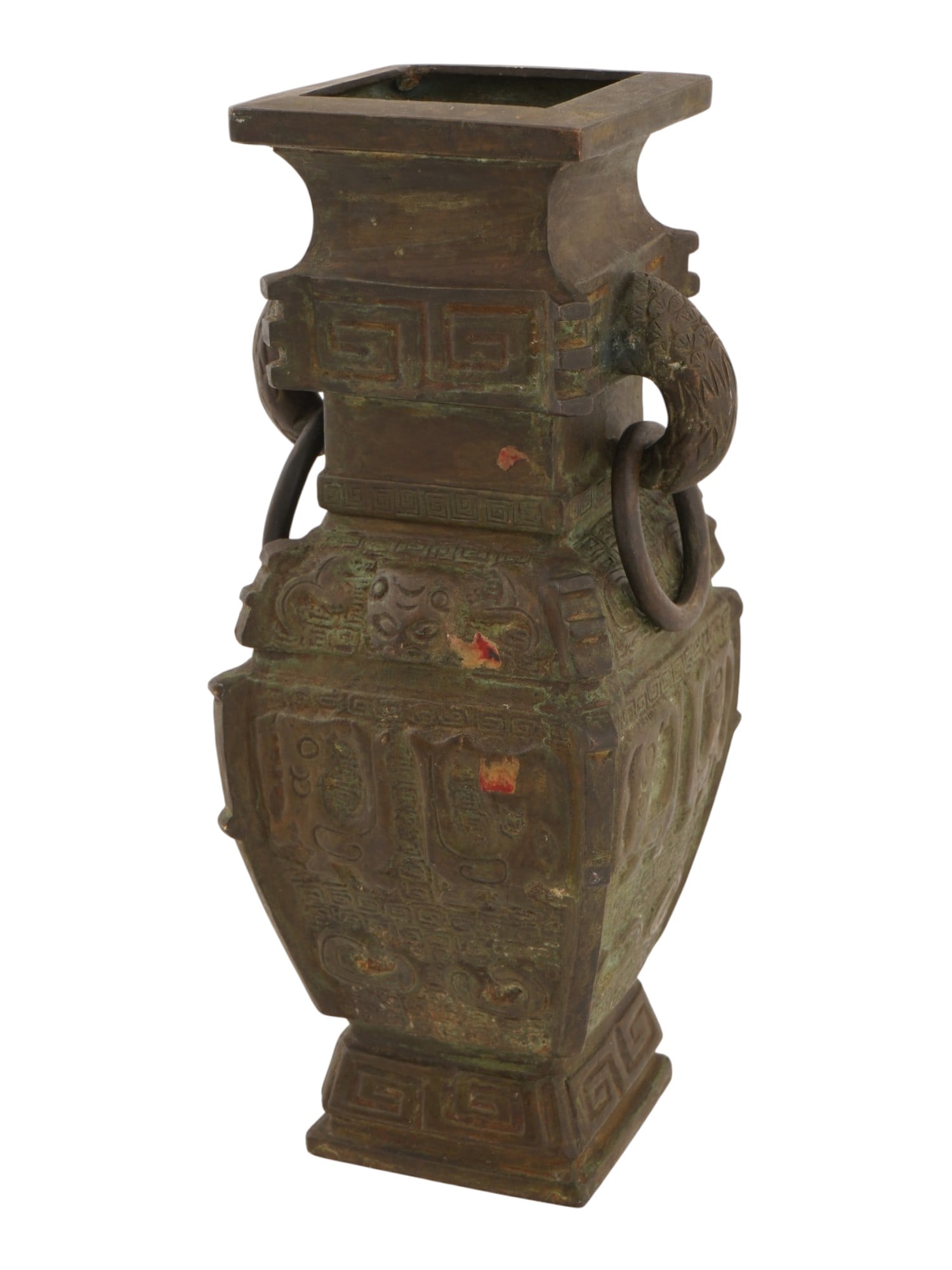 ANTIQUE CHINESE BRONZE FANGHU RITUAL WINE VESSEL: An antique Chinese bronze Fanghu ritual wine vessel.The mark of the Xuande period of the Ming dynasty on the bottom. The bronze vessel features a square base and a wide body intricately decorated with