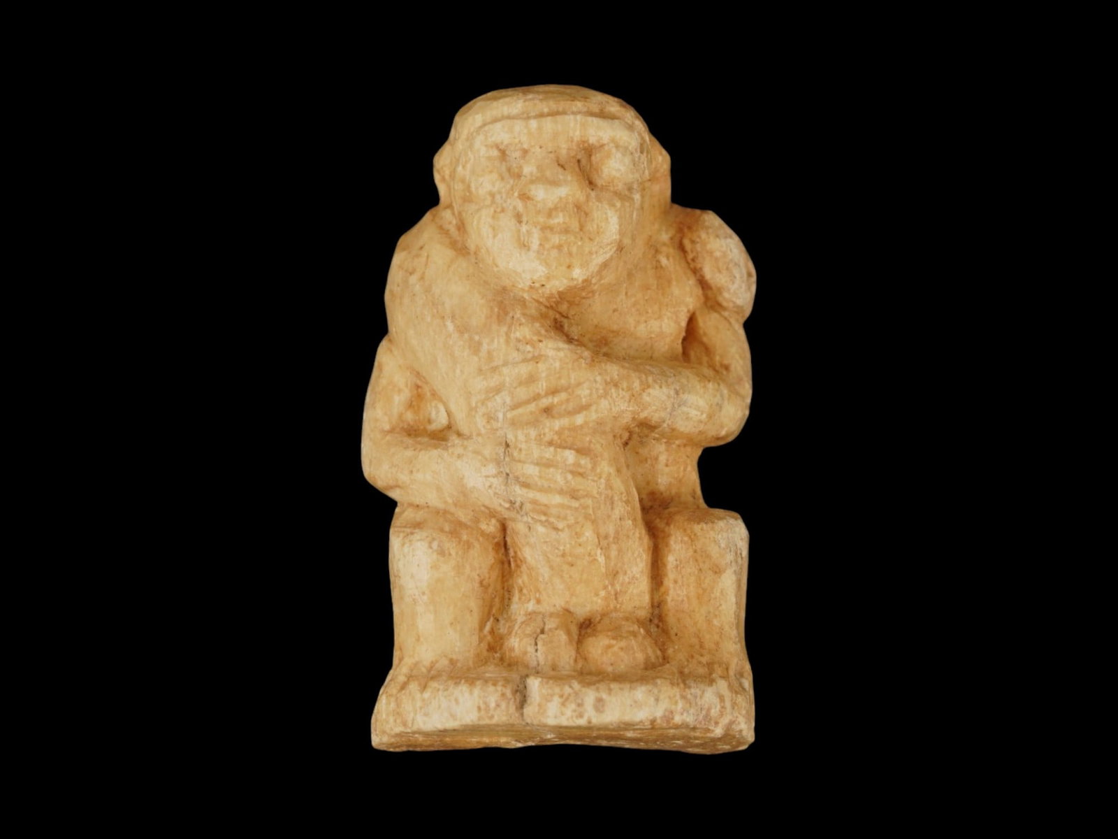 ANCIENT EGYPTIAN EROTIC AMULET WITH DWARF DEITY PATIKOS: An ancient Egyptian erotic amulet depicting the dwarf deity Patikos, dating to the Late Period, circa 700 to 200 BC. The figure is rendered in traditional protective form and retains characteristic re