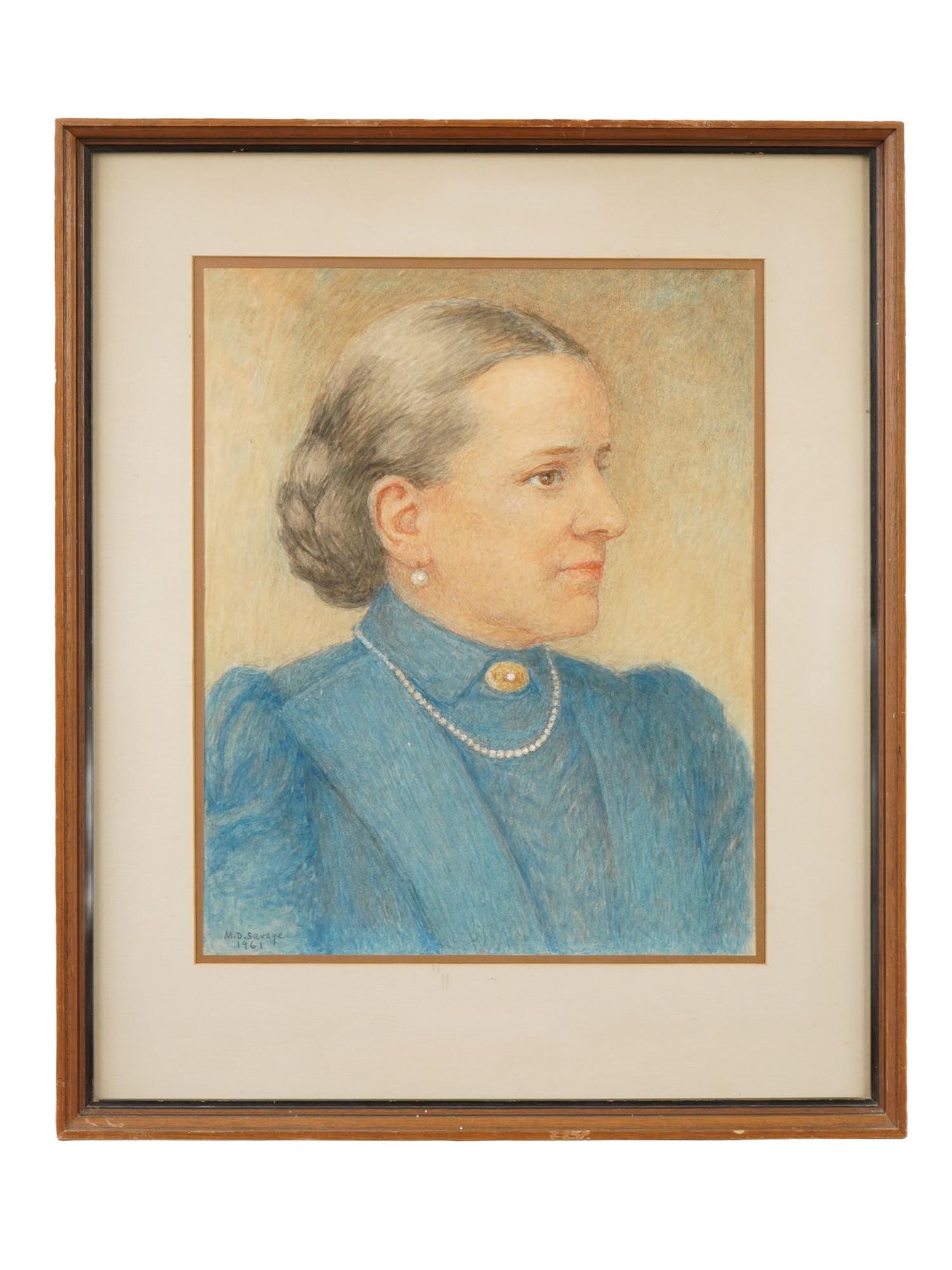 MID CENT FEMALE PORTRAIT PAINTING SIGNED M. D. SAVAGE: A mid-century pastel portrait drawing on paper depicting a woman dressed in blue, signed M.D. Savage and dated 1961 in the lower left. Framed. Mid Century Portraits And Art Collectibles. THIS LOT IS E