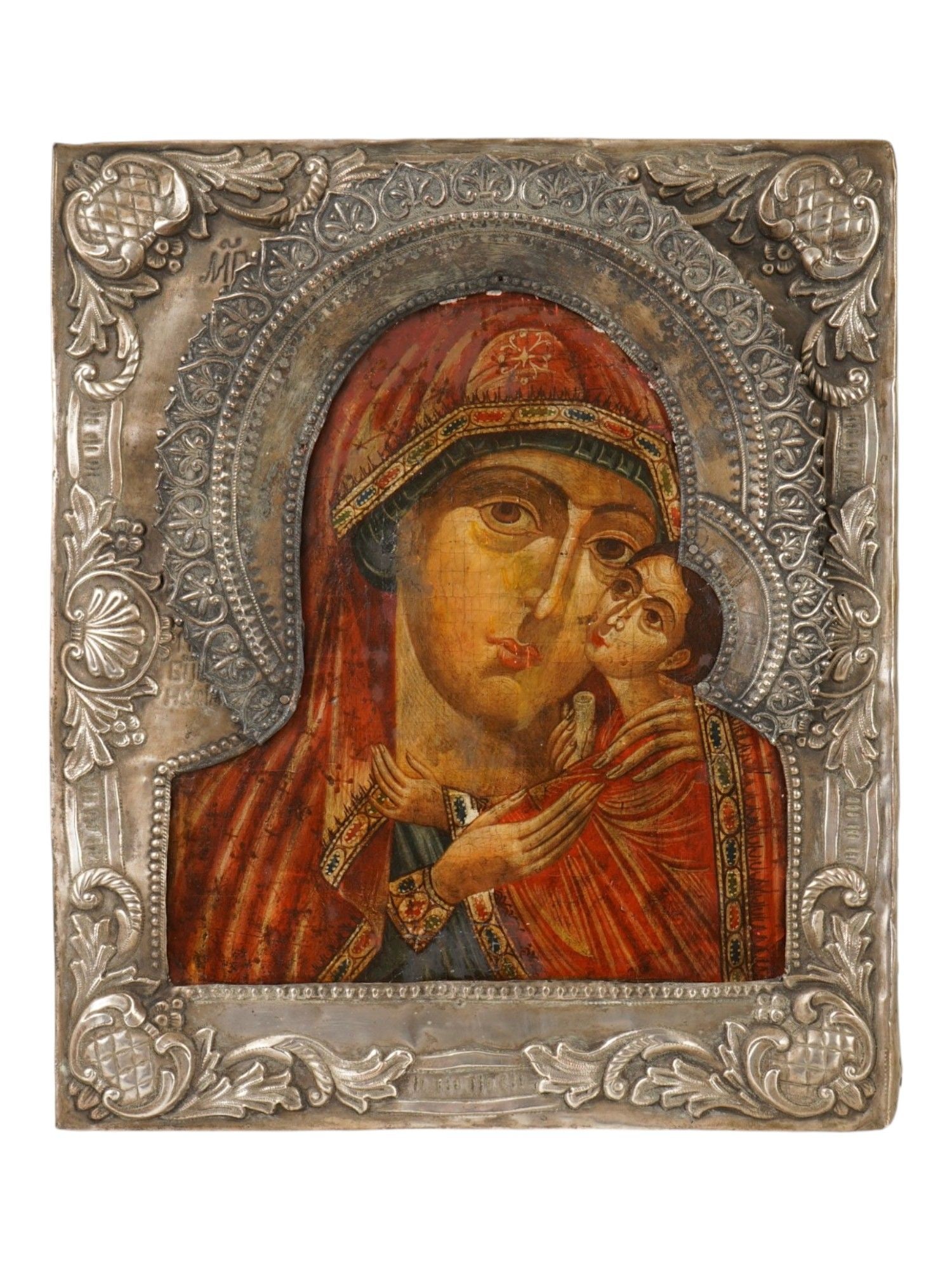 ANTIQUE 19TH C RUSSIAN ICON THEOTOKOS OF TOLGA: An antique 19th-century Russian Orthodox icon of Mother of God of Tolga. Mixed media painting: egg tempera, gesso, and levkas on a wood board, enclosed in a chased riza or oklad. The Theotokos of Tolg