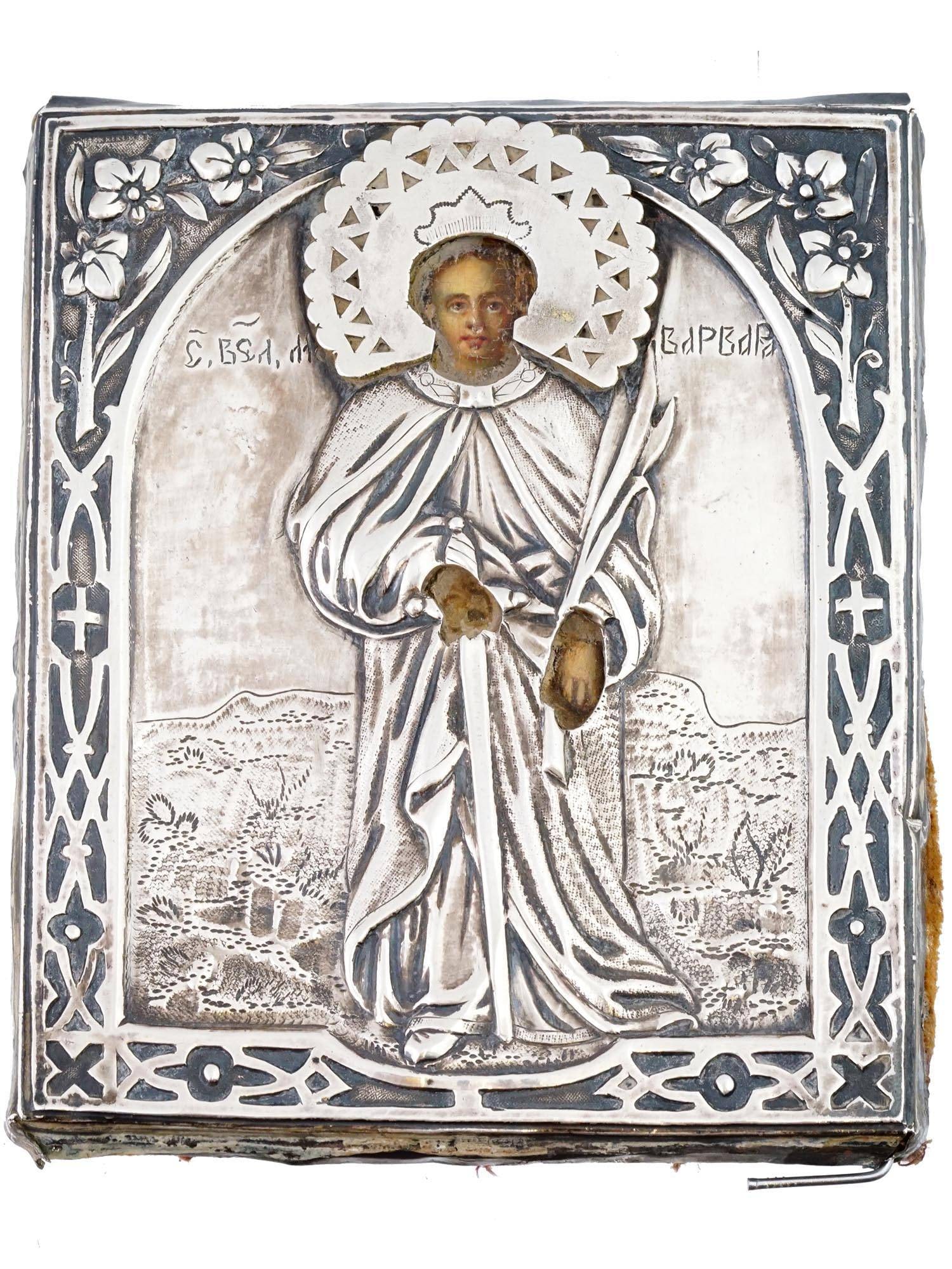 ANTIQUE 19TH C RUSSIAN ICON SAINT BARBARA IN RIZA: An antique late 19th-century Russian Orthodox icon representing the Great Martyr Barbara, an early Christian Greek saint. Mixed media painting: egg tempera, gesso, and levkas on a wood board. Silver r