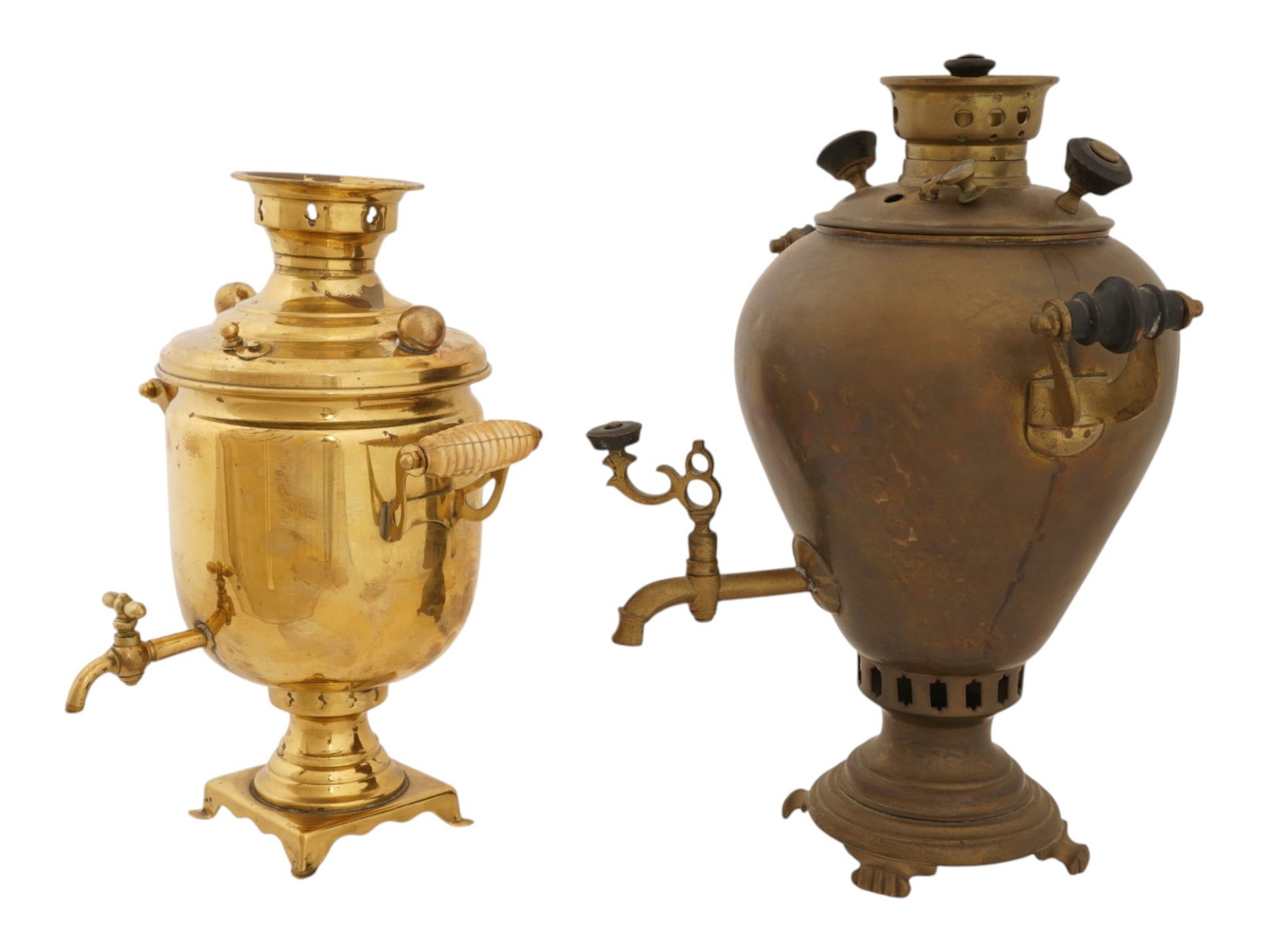 PAIR OF ANTIQUE RUSSIAN BRASS SAMOVARS: A pair of antique Russian brass samovars of egg and jar-shape with a rounded body. Circa the late 19th to early 20th centuries. The samovars are traditional vessels with an internal vertical fire pipe