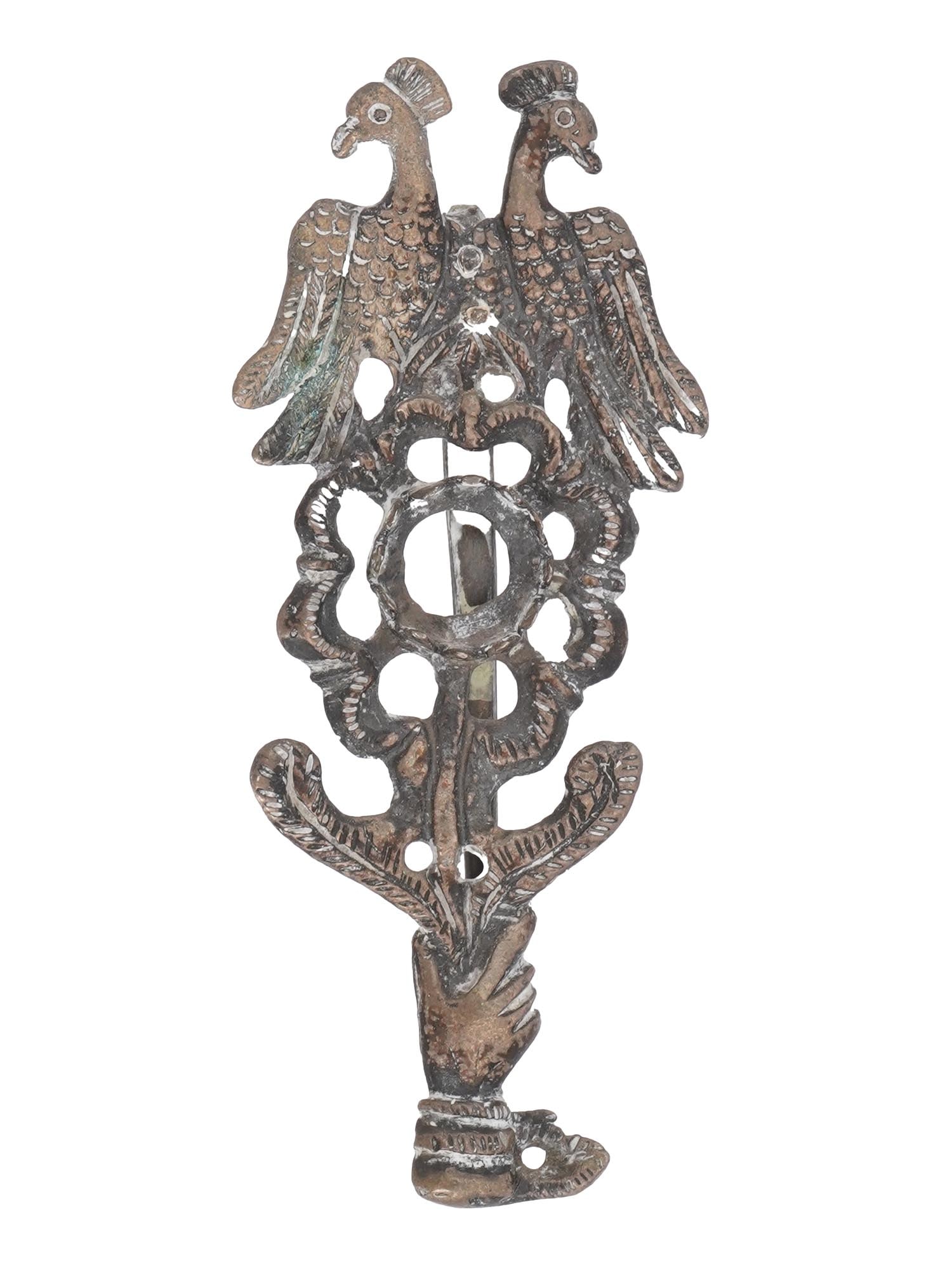 VINTAGE HANDCRAFTED COSTUME JEWELRY BROOCH: A vintage handcrafted costume jewelry vertical brooch with pin back. The openwork brooch depicts a hand holding a flower at the top of which two fairy tale birds are sitting next to each other. Costum