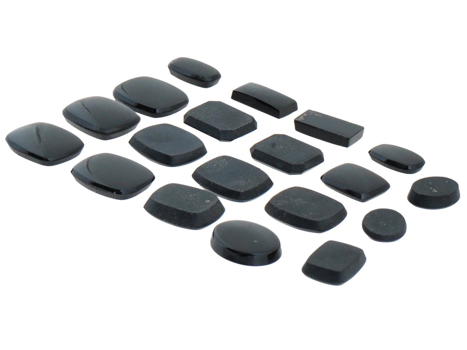 COLLECTION OF ASSORTED HAND CARVED STONE BEADS: A collection of assorted hand carved probably Onyx stone beads in various sizes and shapes. The stones have oval medallion, rectangular, octagonal, and other shapes. Carved Gemstones, Fine Jewelry And
