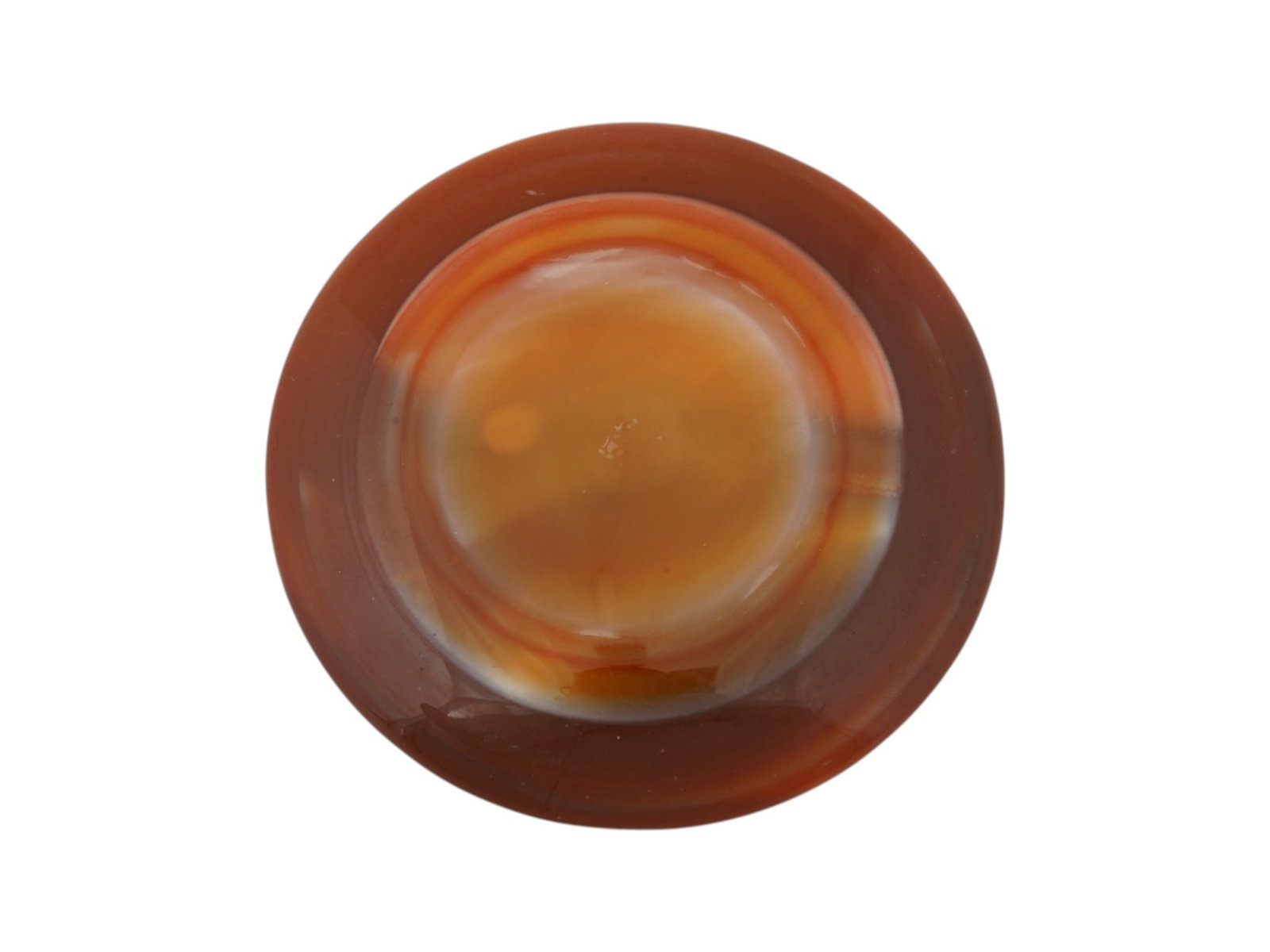 LARGE NATURAL SARDONYX BANDED AGATE CABOCHON: A large natural sardonyx banded agate cabochon. The polished gemstone displays rich translucent layers of orange, amber, and reddish-brown chalcedony framed by dark brown banding. Natural Gemstones An