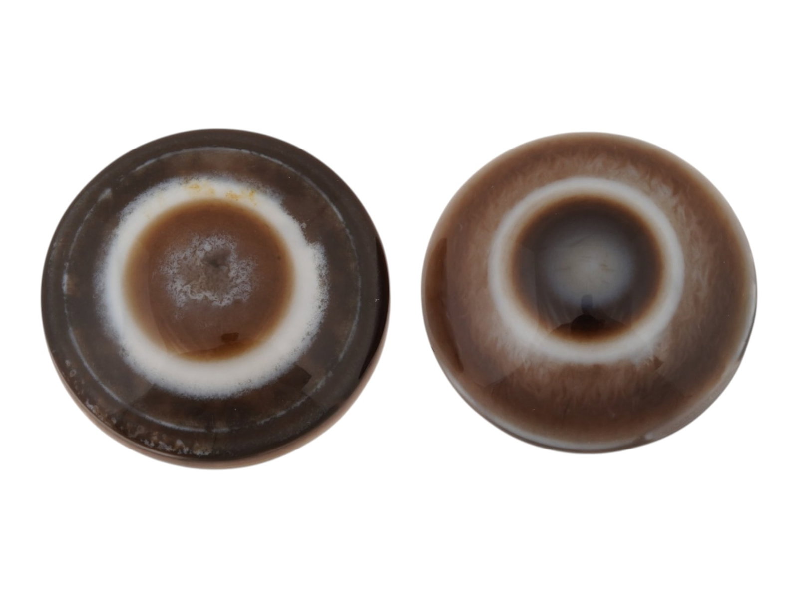 LARGE EYE AGATE STONE BEADS ALSO KNOWN AS BUDDHAS EYE: A lot of two large Eye agate stones also known as Buddhas eye with a characteristic concentric pattern resembling the human eye. This unique pattern forms naturally in the cavities of volcanic rocks. 