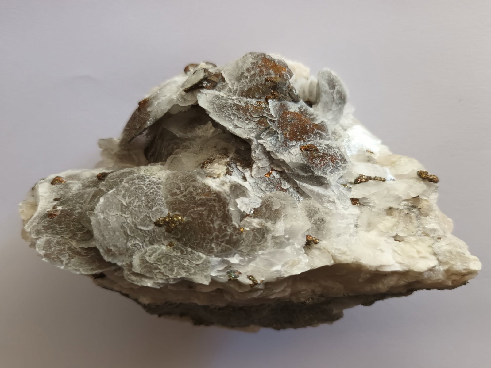 FISHSCALY CALCITE: Fishscaly calcite with iridescent pyrite (ca50). Weight: 287 grams. Origin: Chenzhen Pref. Hunan Prov. China. THIS LOT QUALIFIES FOR A 30-DAY UNCONDITIONAL RETURN FROM THE DATE OF SALE. BUYERS ARE