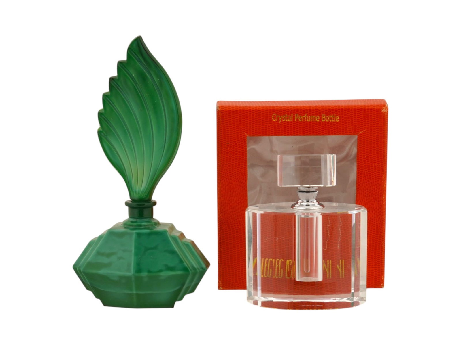 VTG ART DECO GLASS AND CRYSTAL PERFUME BOTTLES: A lot of two Art Deco glass perfume bottles. The lot includes a malachite glass faceted bottle with a high stopper inspired by a birds wing, ca. 1930s and a transparent faceted crystal bottle of the A