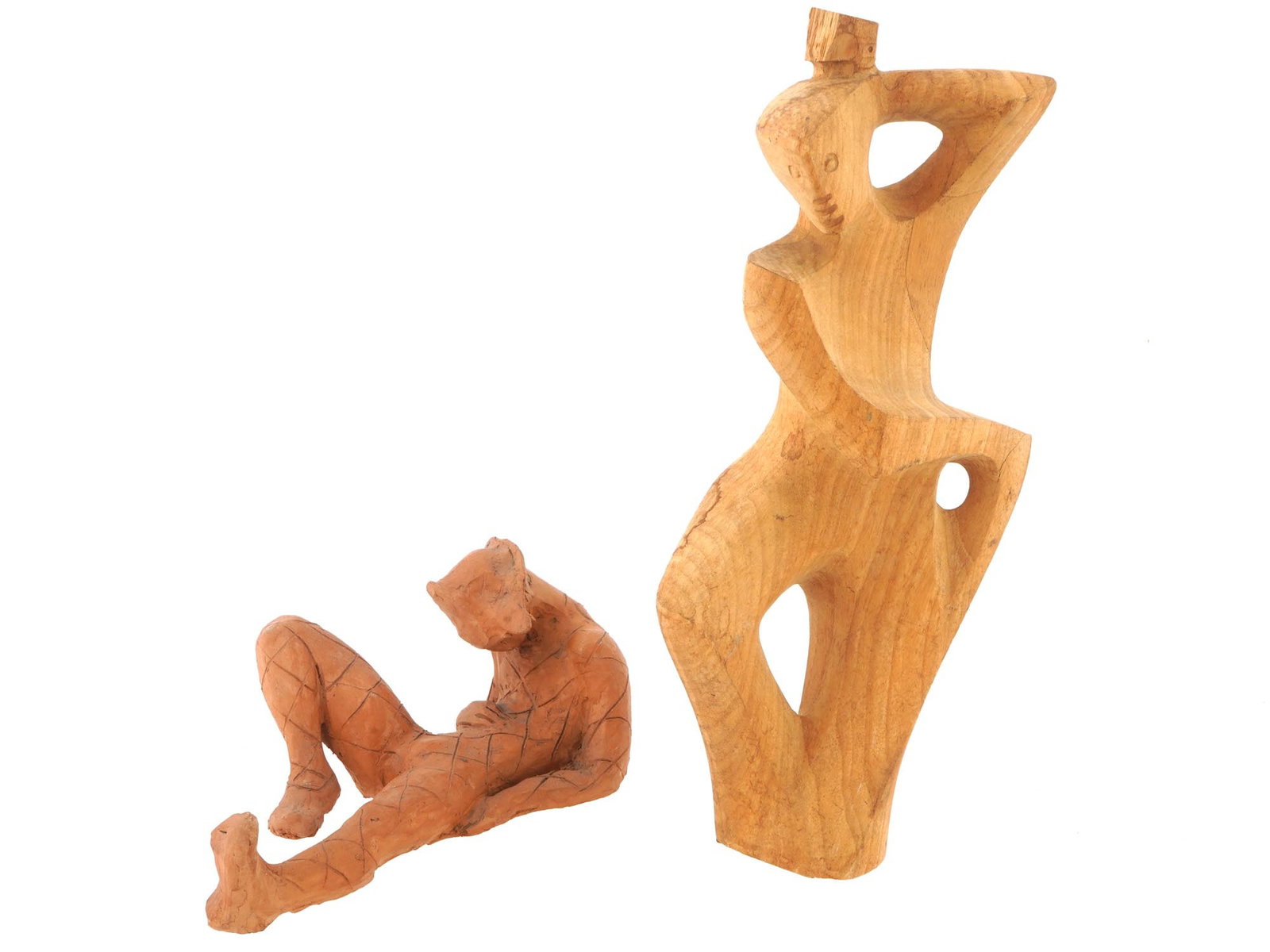 VINTAGE 1980S POTTERY AND CARVED WOOD FIGURINES: A lot of two vintage, 1980s pottery and wood figurines. The ceramic figurine depicts a reclining male figure with his head bowed low. The artists name, Lambertini, and the date 1980 are on the bottom.
