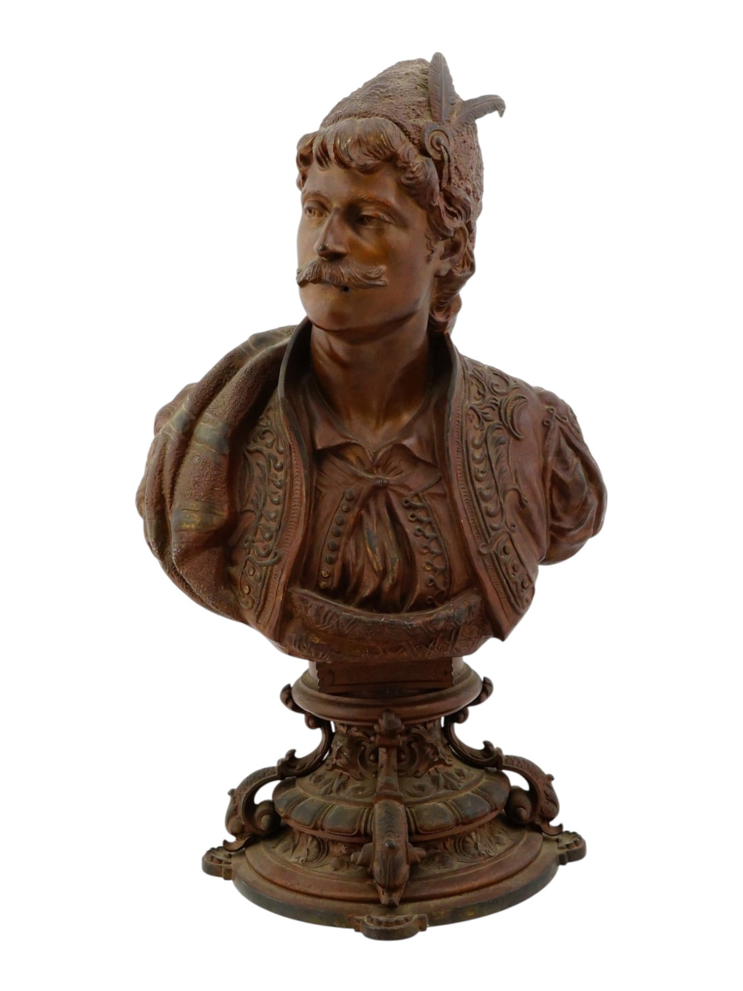 ANTIQUE EARLY 20TH C FRENCH ORIENTALIST MALE BUST: An antique French brown-patinated antimony light metal sculpture. Dated ca. 1900s. The piece represents a bust of a young man with a mustache, dressed in orientalist clothing and headdress, resting on