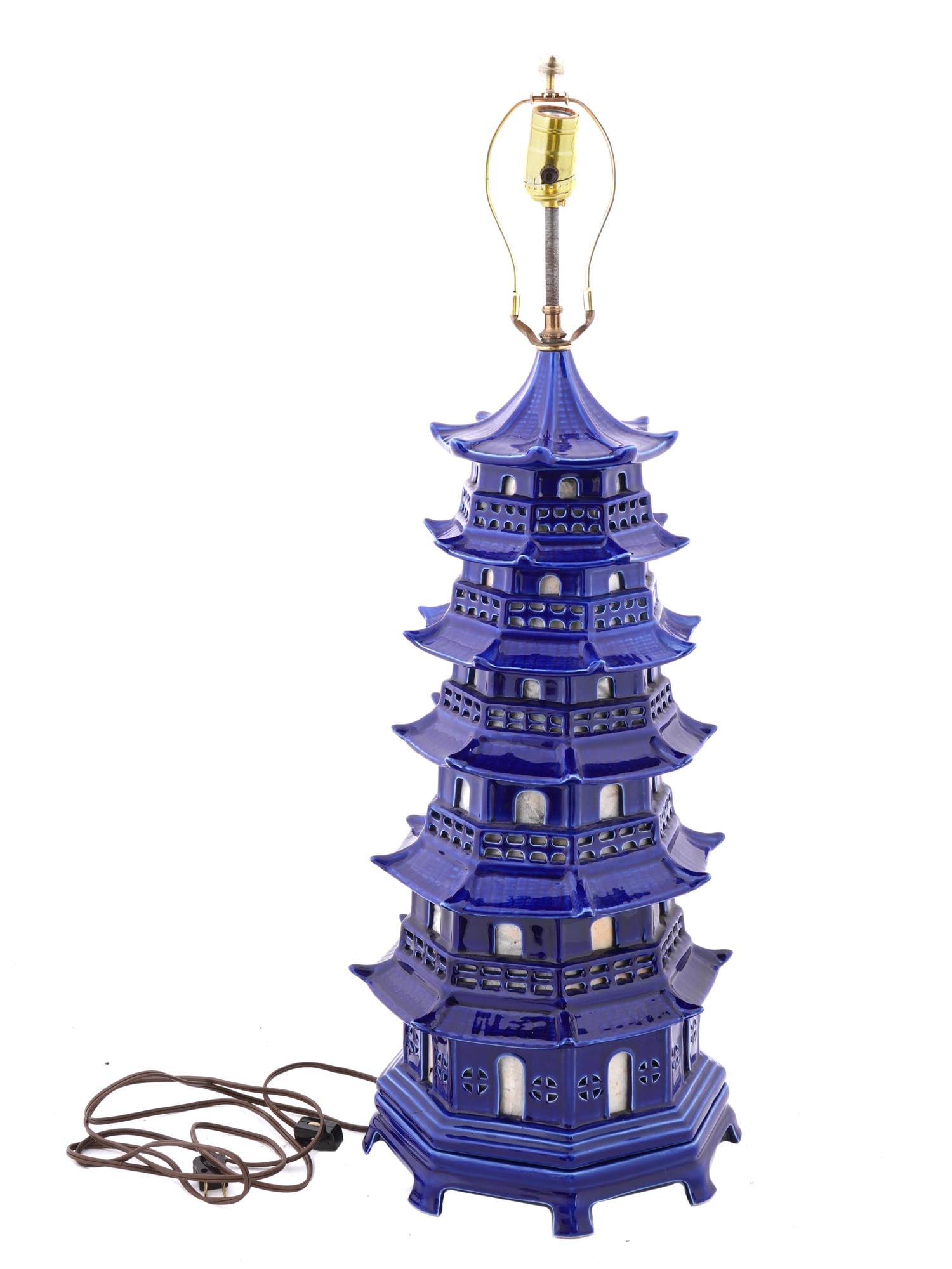 ASIAN CHINOISERIE FIGURAL PAGODA PORCELAIN DESK LAMP: A Modern Asian Chinoiserie manner, probably Chinese, figural porcelain desk lamp. The lamp is made in the shape of a Pagoda, adorned with windows and fluted roofs, and covered with enamel in a cobalt 