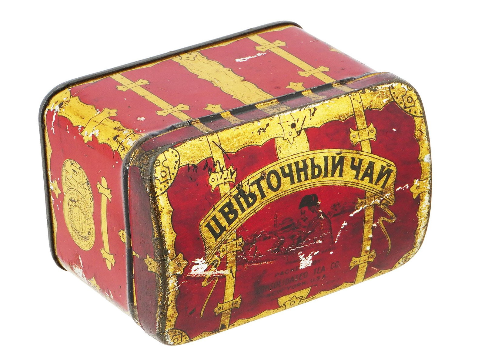 AMERICAN HINGED TIN TEA BOX BY CONSOLIDATED TEA CO: A vintage American tin originally contained tea packed by the Consolidated Tea Company of New York. The tea was sold under the Swee Touch Nee Tea brand. The lid reads: Tea Tin Trunk Russian Trade, Swe
