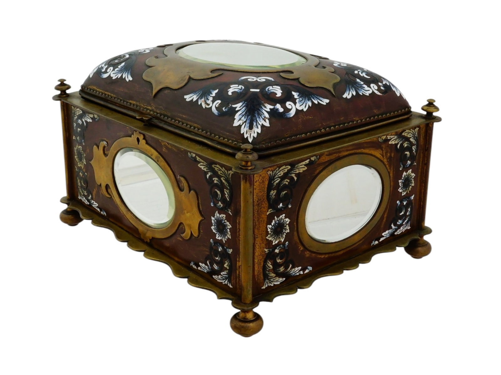 ANTIQUE FRENCH RENAISSANCE REVIVAL ENAMEL JEWELRY BOX: An exquisite antique French Renaissance Revival champleve enamel jewelry box. Circa the mid-19th century. The exterior of the ware set with oval mirror inserts and decorated with floral enamel details