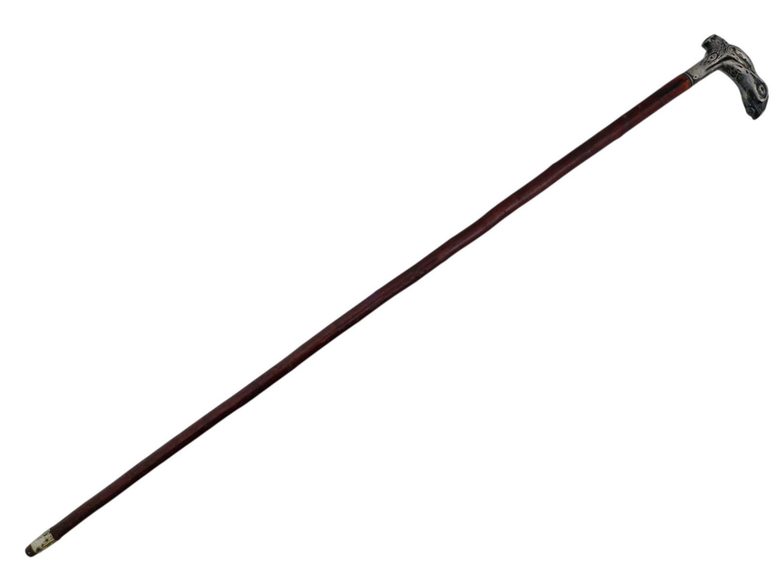 ANTIQUE BRITISH WALKING CANE WITH SILVER HANDLE: An antique late 19th to early 20th-century British walking cane. Hardwood stick with a silver handle designed as raw wood and etched with the initial owner's name, T.A. Lambert. Collectible Accessorie