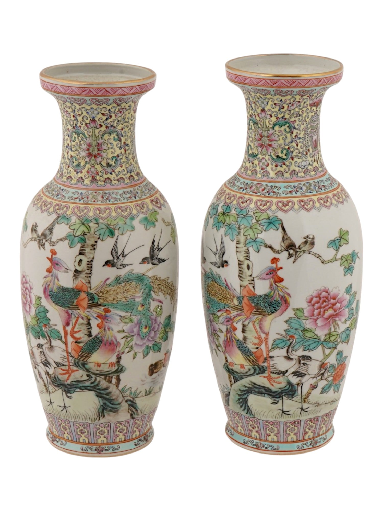 PAIR OF ANTIQUE CHINESE FAMILLE ROSE PORCELAIN VASES: A pair of matching Chinese porcelain vases. Republic of China, 1912 to 1949. Baluster shape. Elaborate hand-painted Famille rose decoration featuring a central panel with birds on the obverse and a po