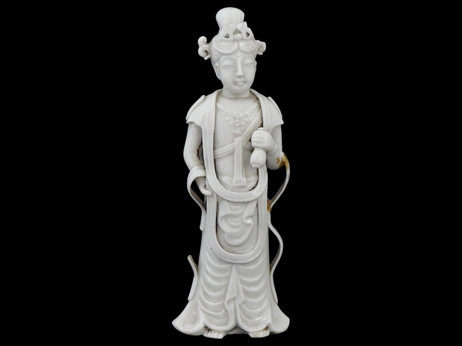 CHINESE GLAZE CERAMIC FIGURINE OF GUANYIN GODDESS: A Chinese ceramic sculpture representing Guanyin, a character of Chinese, Vietnamese, Korean, and Japanese mythology, a bodhisattva or a deity who appears mainly in a female form, saving people from a