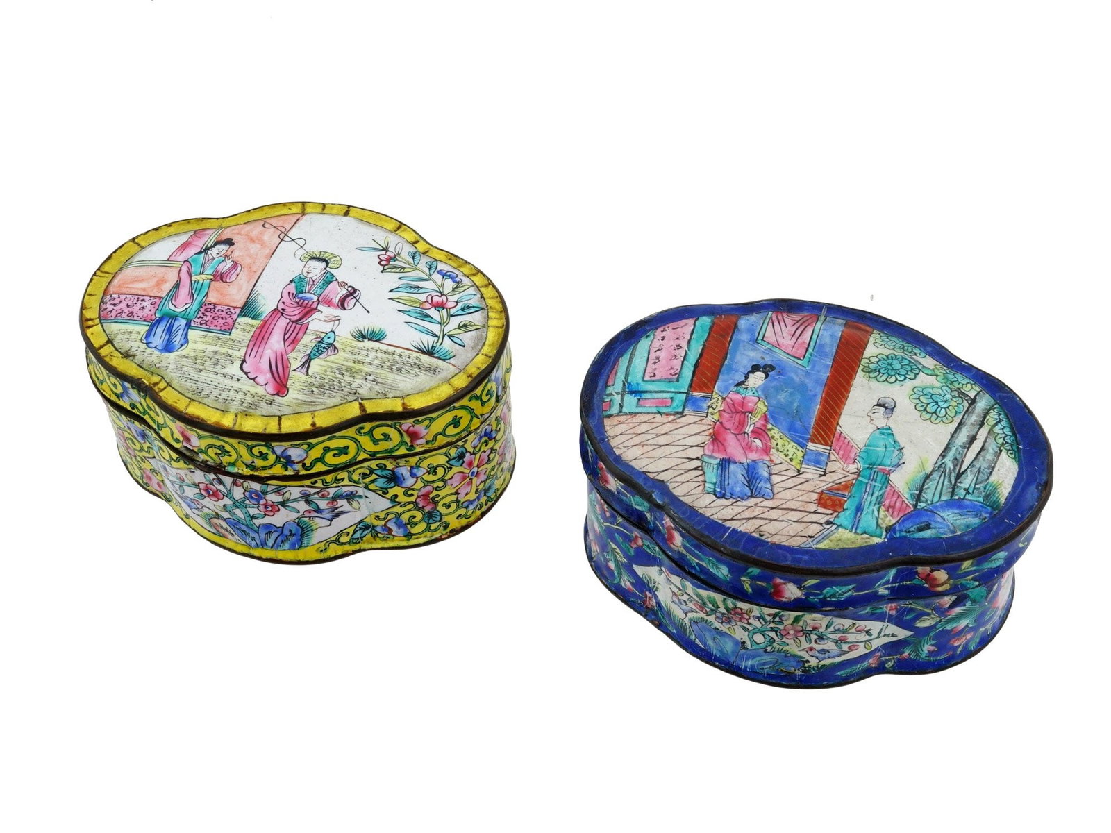 ANTIQUE CHINESE CANTON EXPORT ENAMEL TRINKET BOXES: A pair of antique Chinese Cantonese enameled copper trinket boxes. Late Qing dynasty, before 1912. Quatrefoil shape. Hand-painted multi-figure scenes, floral blossoms, and peaches. Yellow and cobalt b
