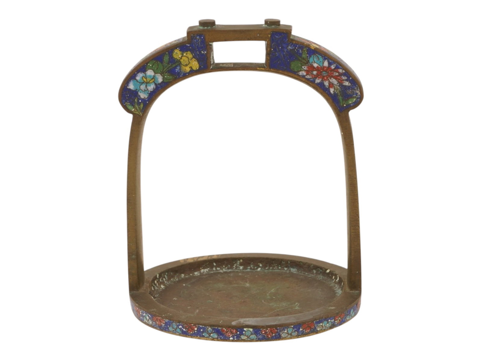 RARE ANTIQUE CHINESE BRONZE CLOISONNE ENAMEL STIRRUP: A rare antique Chinese solid cast bronze stirrup covered with cloisonne enamel. The item features a characteristic wide footrest and is decorated with floral motifs made in the cloisonne technique. An
