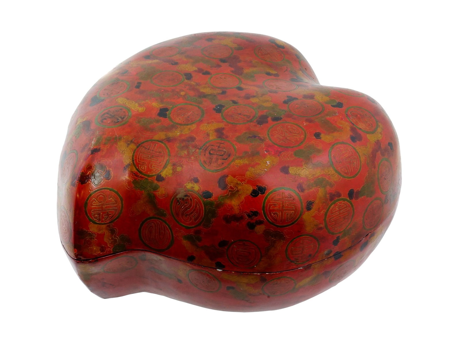 ANTIQUE CHIINESE PEACH SHAPED RES AND GILT LACQUER BOX: An antique Chinese peach shaped lidded box is finished with a complex polychrome lacquer technique. The exterior features a vibrant red ground accented by delicately carved concentric circles with ben