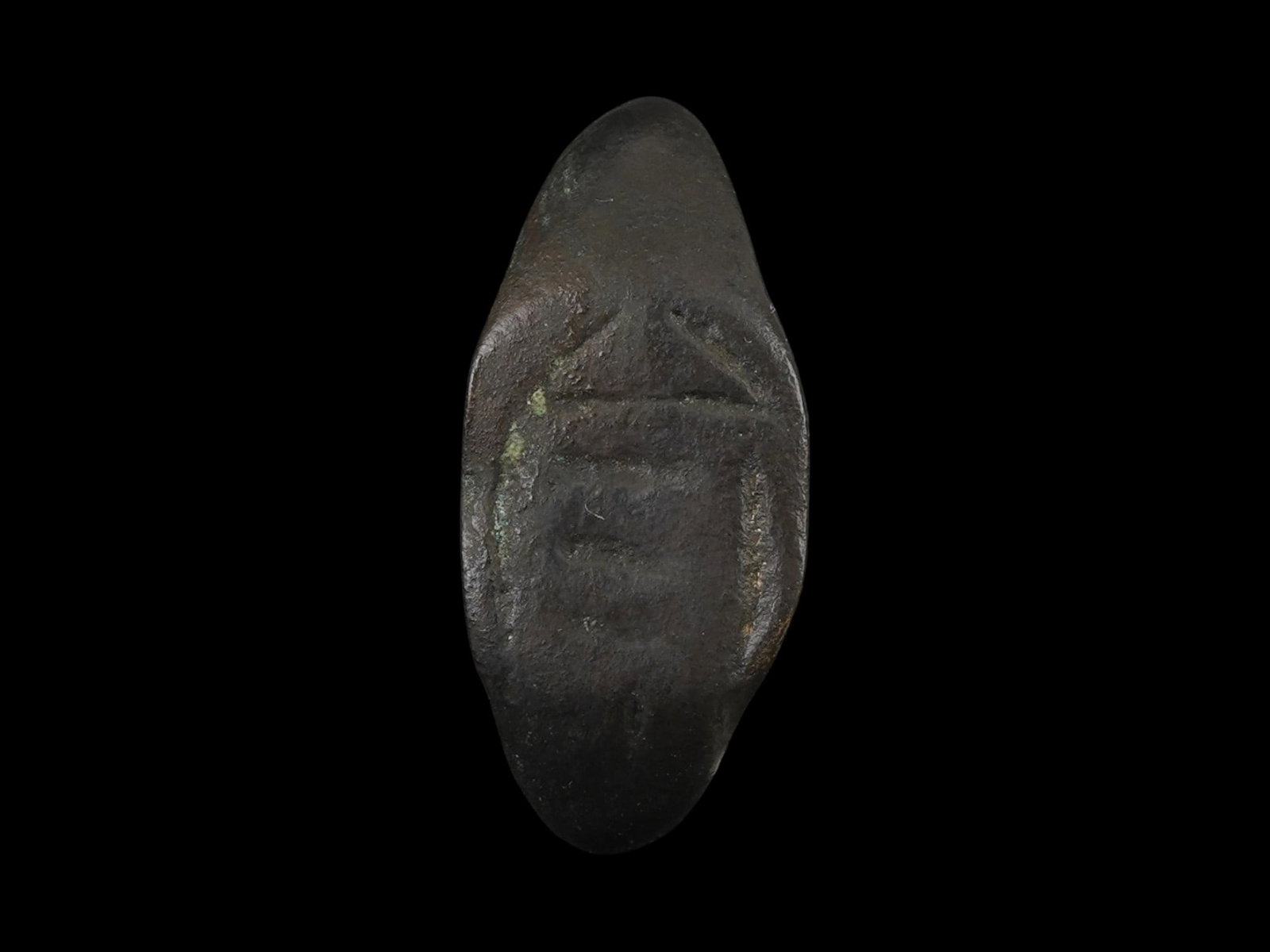 ANCIENT ROMAN JUDAICA BRONZE RING WITH A TEMPLE MOTIF: An ancient Roman Judaica bronze ring, dating to approximately 300 to 100 BC. The bezel is engraved with a temple motif associated with ancient religious symbolism and craftsmanship. Ancient Artifact A