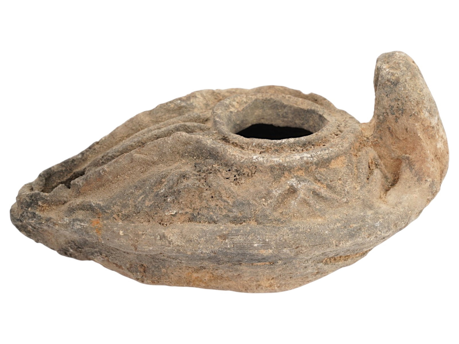 ANCIENT JUDAICA TERRACOTTA OIL LAMP W MENORAH MOTIFS: An ancient Judaica terracotta oil lamp dating from the 3rd to 5th century AD, decorated with the menorah motifs along the sides, symbolizing its connection to Jewish religious tradition and heritage. 