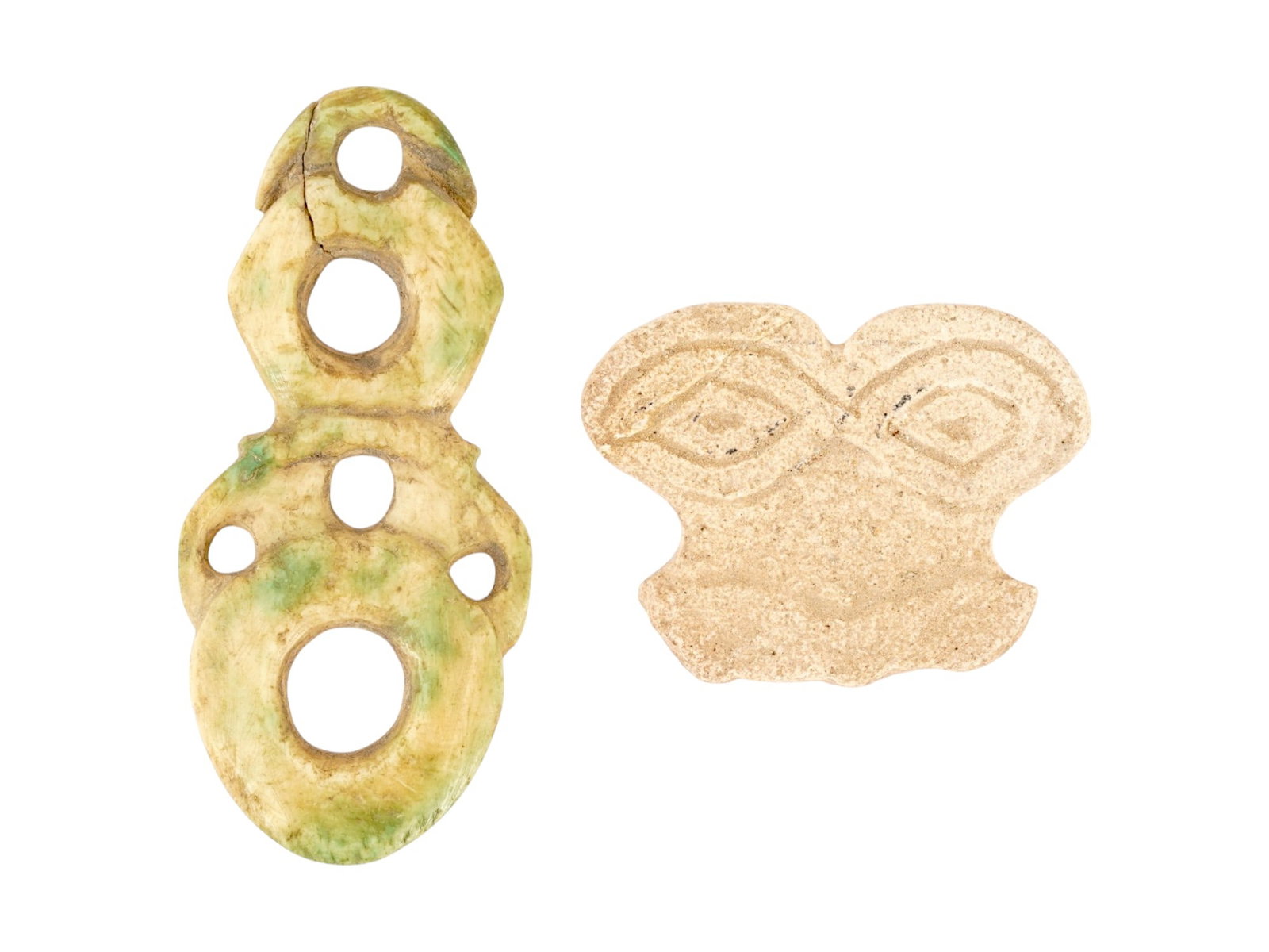 ANCIENT NEAR EASTERN EYE IDOL AND FERTILITY IDOL: A lot of two ancient idol sculptures. Bronze Age, ca. 2nd to 1st Millenium BC. First. A votive figurine from the Eye Temple in Tell Brak, modern day Syria. Second. A pierced stone fertility idol. Arch