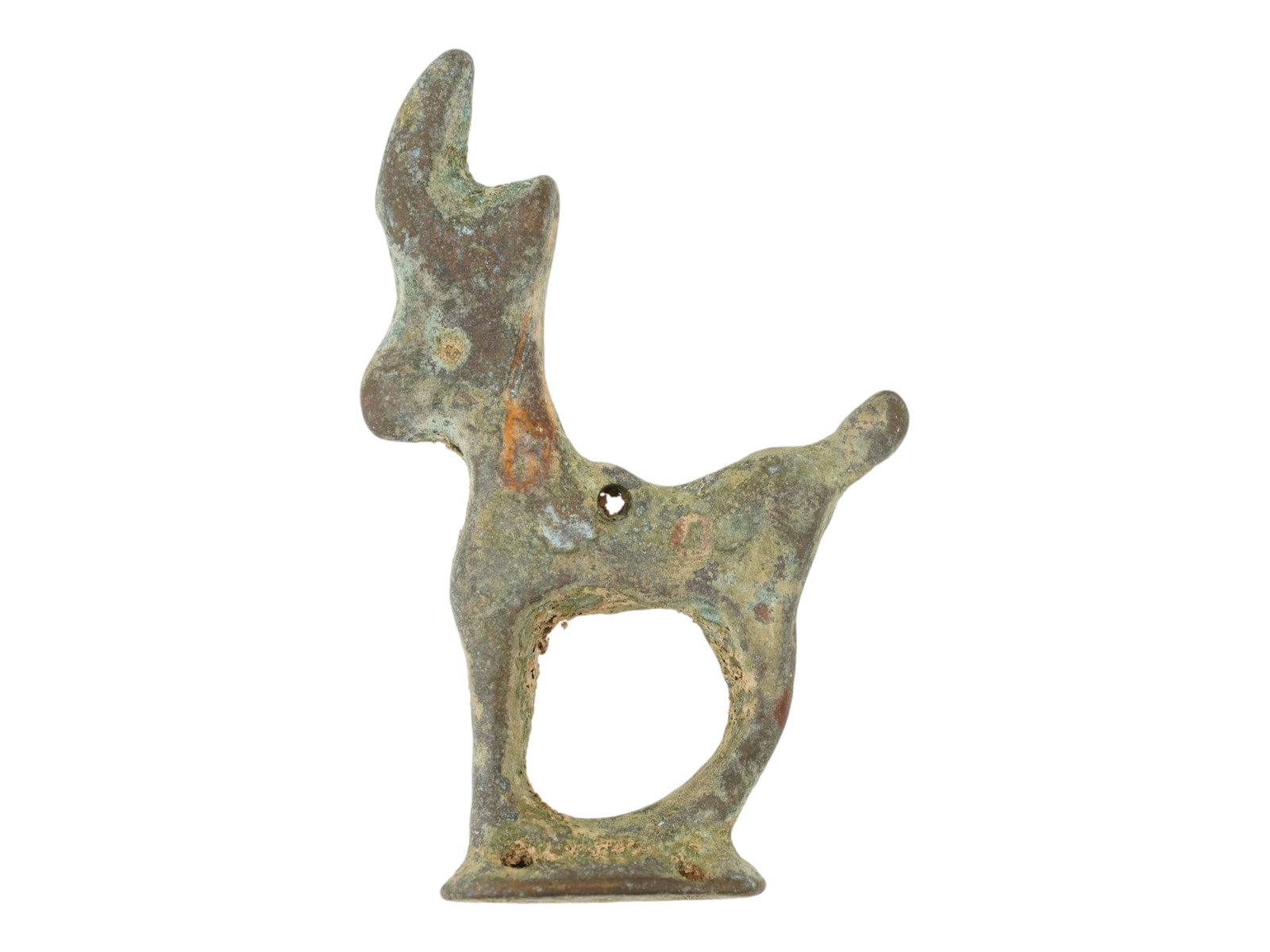 ANCIENT LURISTAN CULTURE BRONZE DEER AMULET: An ancient Luristan bronze deer amulet dating to circa 700 to 500 BC, originating from the mountainous regions of western Iran and characteristic of the distinctive metalwork of the Luristan culture. 