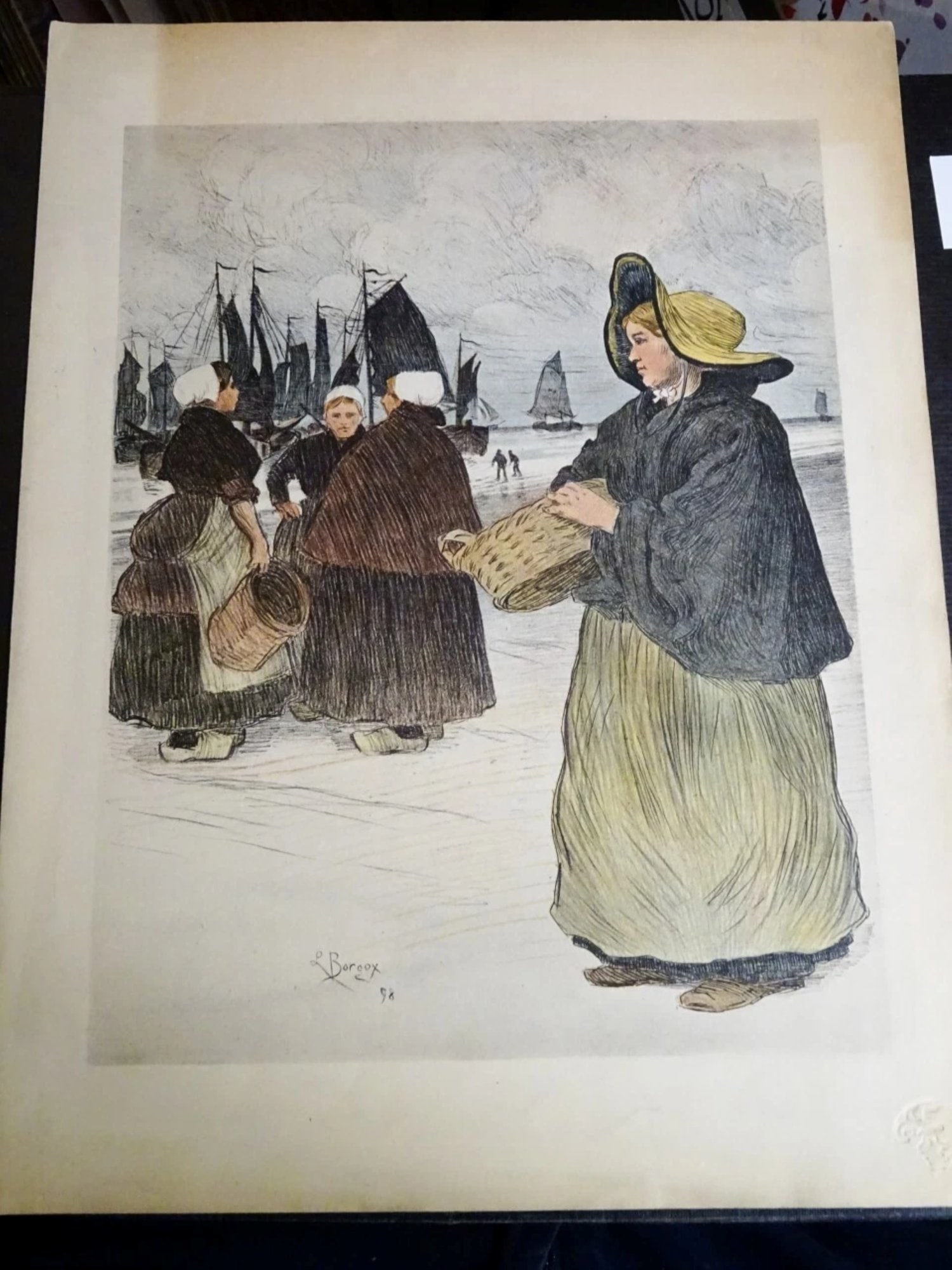 RARE HAND-COLOURED LITHOGRAPH "THE SARDINIÈRES" L BOURGEX: Rare lithograph depicting 'the sardine fishers'Borgex (French, late 19th century)The Sardine Gatherers, from L’Estampe Moderne, 1898Hand-coloured etching on paper, signed and dated “Borgex
