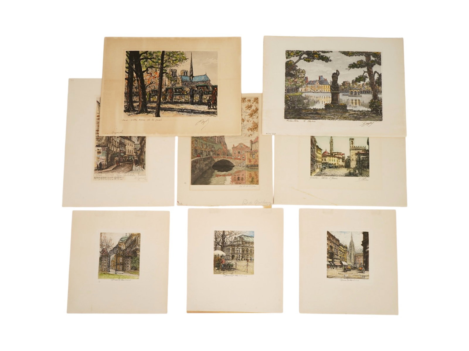 VINTAGE SIGNED ETCHINGS POPULAR EUROPEAN DESTINATIONS: A collection of eight vintage hand-signed color aquatint etchings depicting romantic architectural views and street scenes of popular European destinations. The works feature historic landmarks, canal