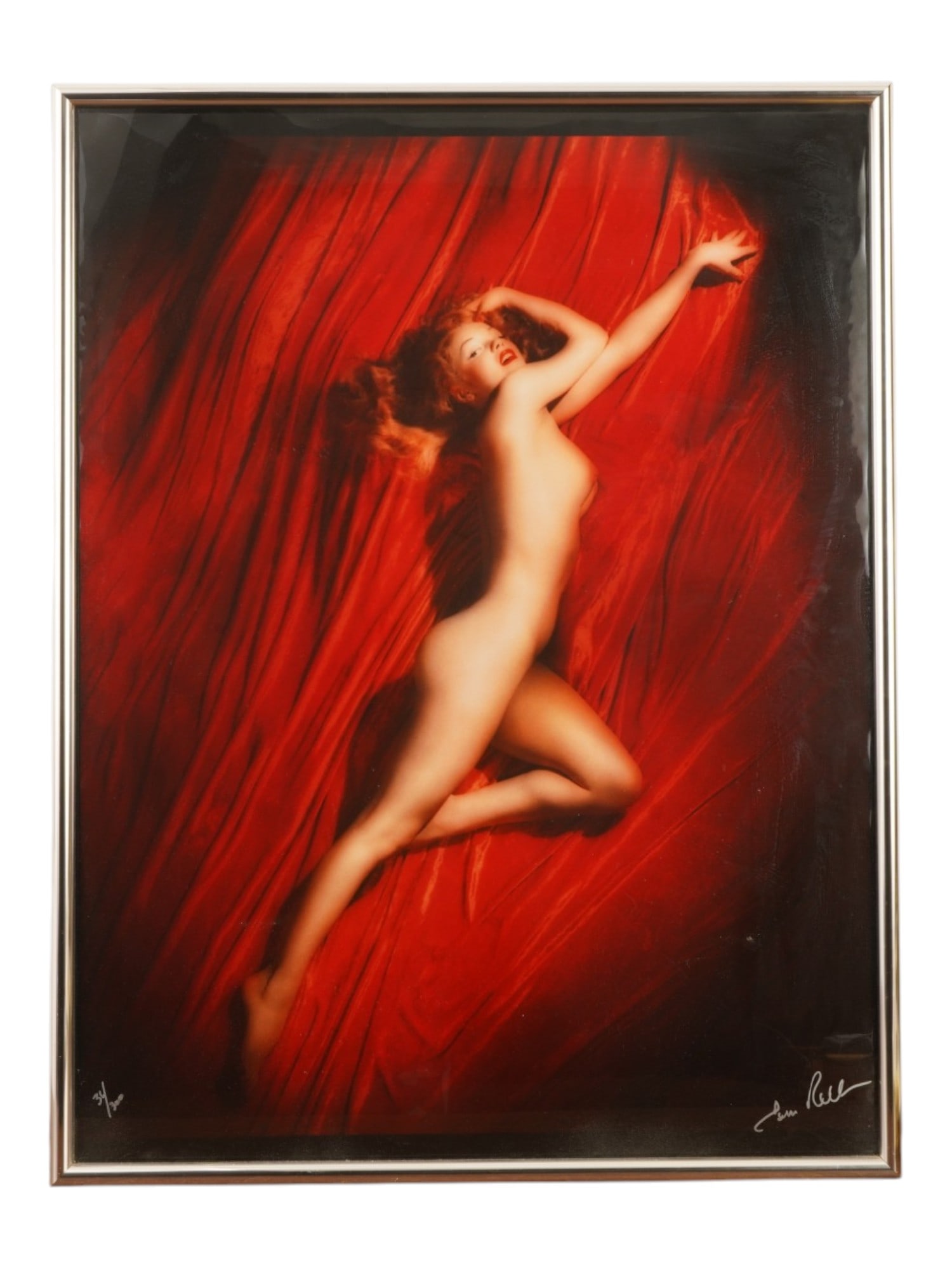 MARILYN MONROE ON RED VELVET SIGNED TOM KELLEY PRINT: A limited-edition archival print of Marilyn Monroe on Red Velvet, Pose No. 2, photographed by celebrated Hollywood photographer Tom Kelley Sr. in May 1949. The image captures Monroe posed against rich