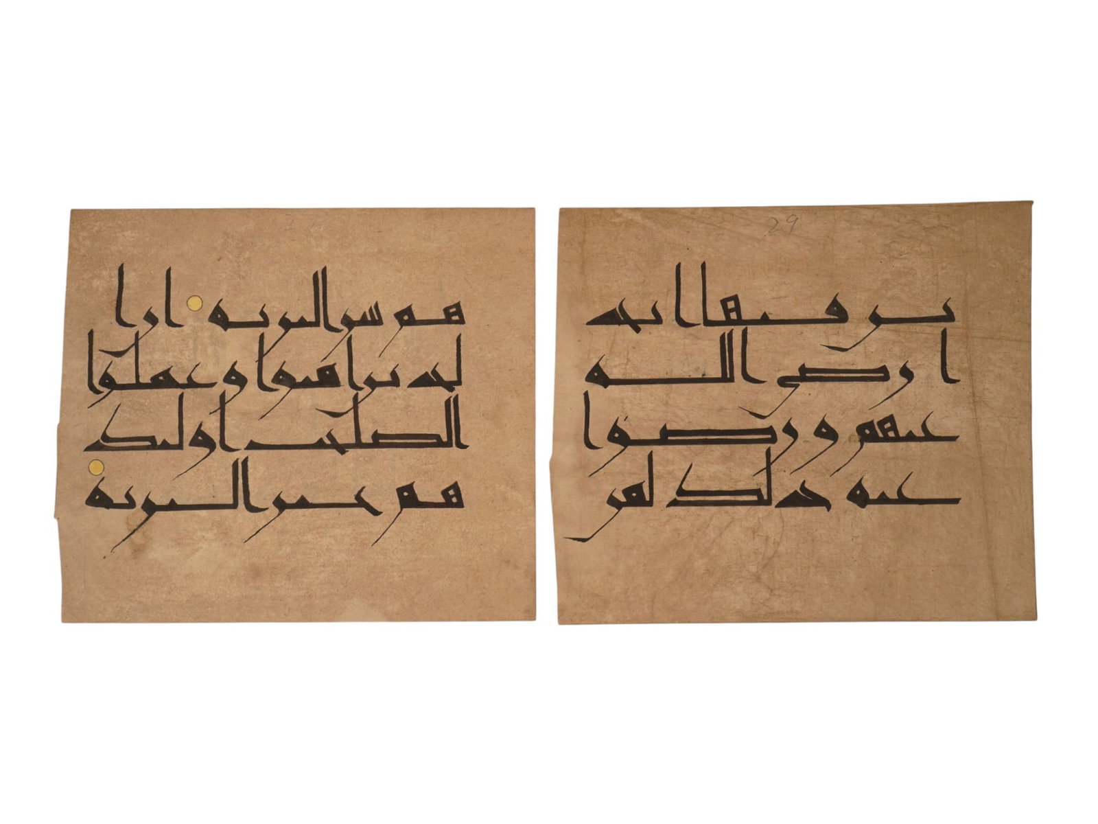 PAIR OF ISLAMIC KUFIC CALLIGRAPHY FOLIOS: A pair of mid 20th-century Islamic pages of folios with hand-written Kufic calligraphy and decorative gilding. Oriental Islamic Arabic Collectibles, Antiquarian Librarian Pieces, Religious Items.