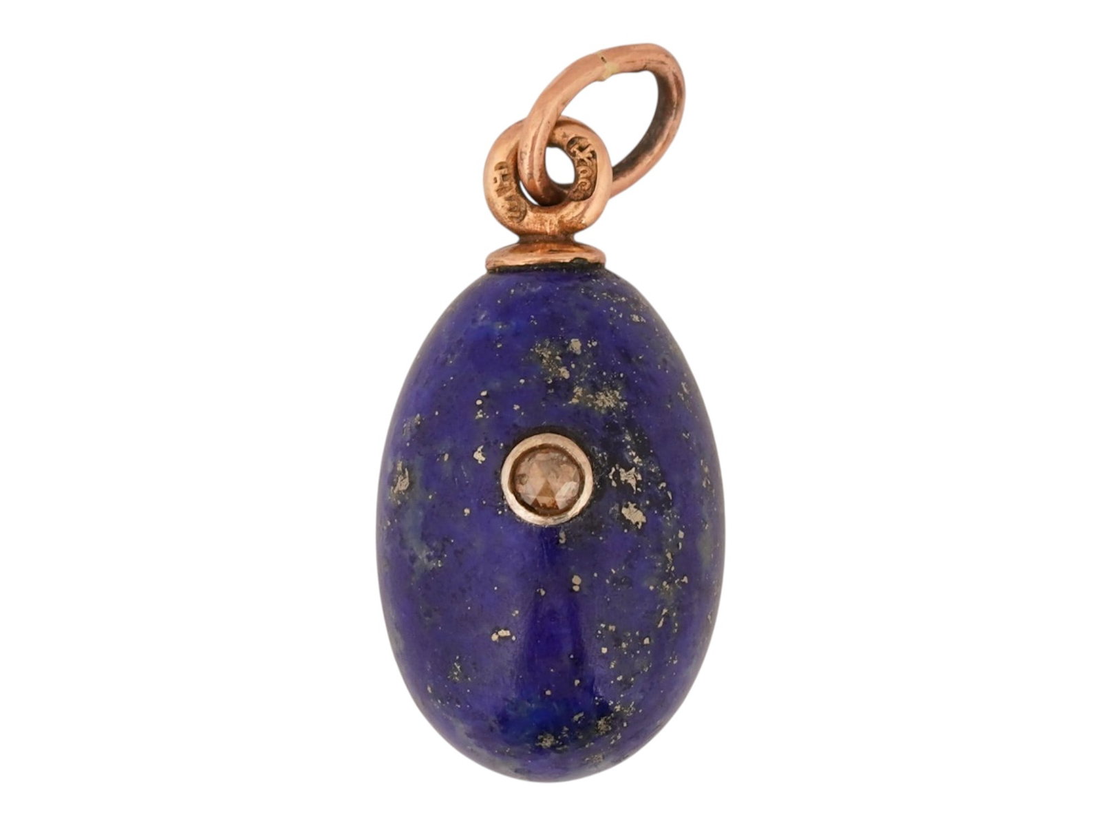 RUSSIAN 56 GOLD LAPIS LAZULI EGG PENDANT W DIAMOND: A Russian 14K Gold and hand carved Lapis Lazuli Easter egg pendant with diamond. The egg is made of Lapis Lazuli stone and set with diamond in Gold fittings. Marked with a Russian Gold standard hallma