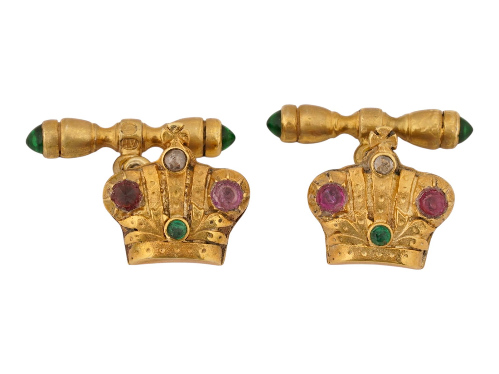 PAIR OF RUSSIAN GILT SILVER CROWN CUFFLINKS W GEMSTONES: A pair of Imperial Russian crown cufflinks crafted in gilt silver and embellished with colorful gemstones. Each crown features rose-cut diamonds, cabochon rubies and emeralds, connected by hinged