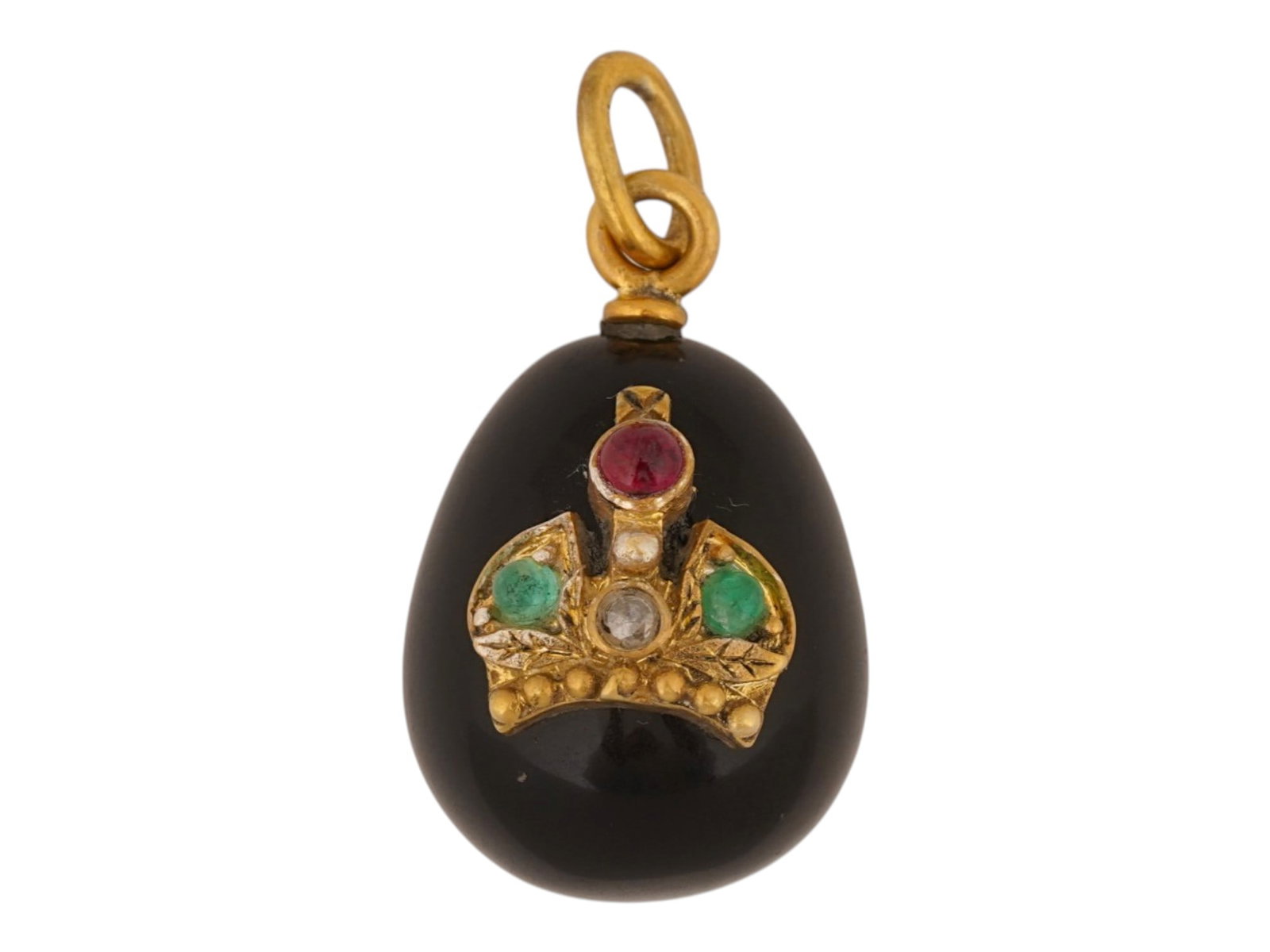 RUSSIAN JADE RUBY EMERALD DIAMOND EASTER EGG PENDANT: A Russian carved black jade Easter Egg pendant. Gilt silver fittings and crown motif on the obverse, garnished with ruby, diamonds, and emeralds. Hallmark of 88 silver standard and makers mark are on