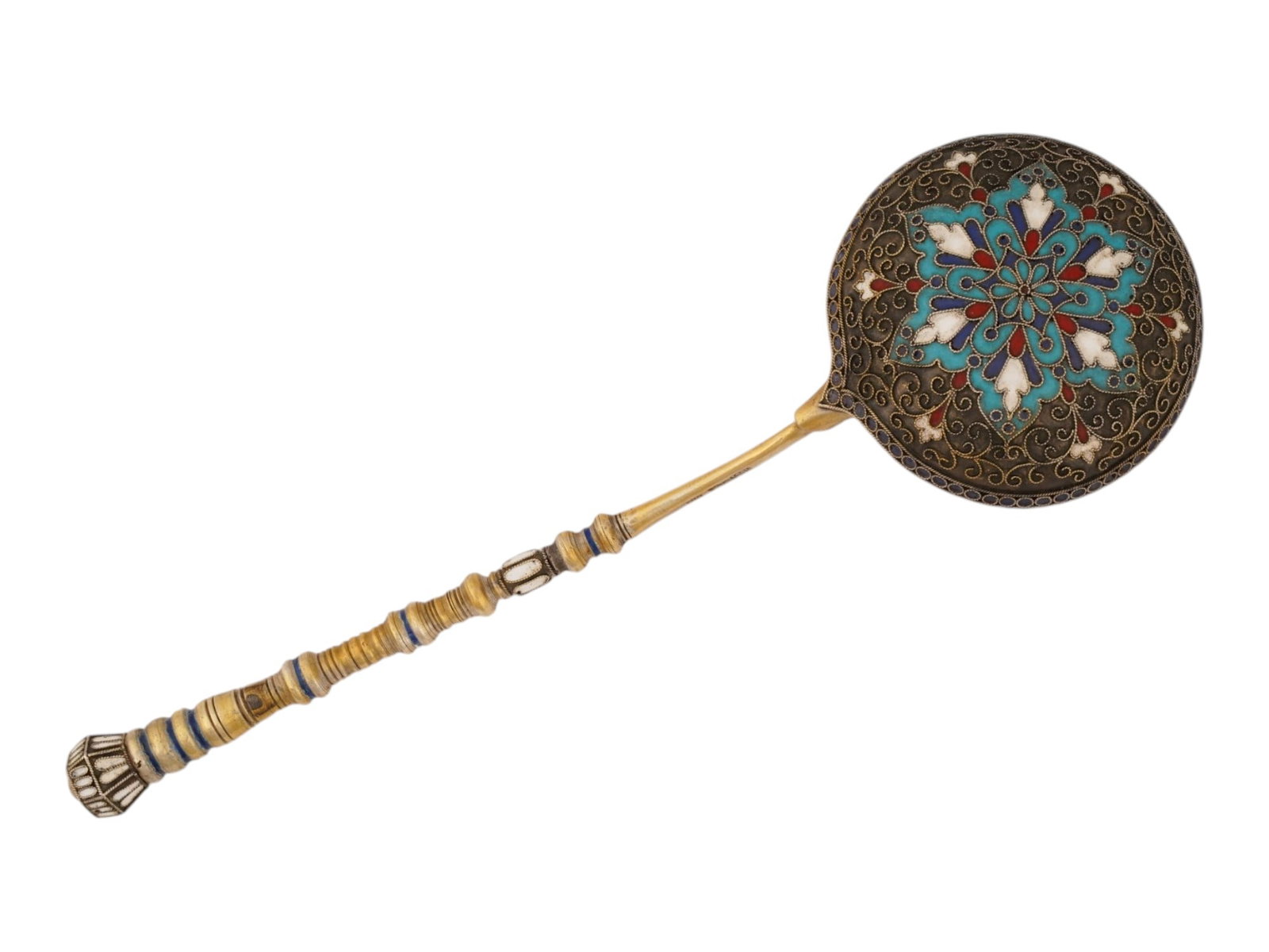 RUSSIAN GILT SILVER CLOISONNE ENAMEL SERVING SPOON: A Russian gilt silver serving spoon. The figurative handle and the backside of the bowl are garnished with cloisonne enamel ornaments in red, white, and blue. Hallmark of 84 silver standard and