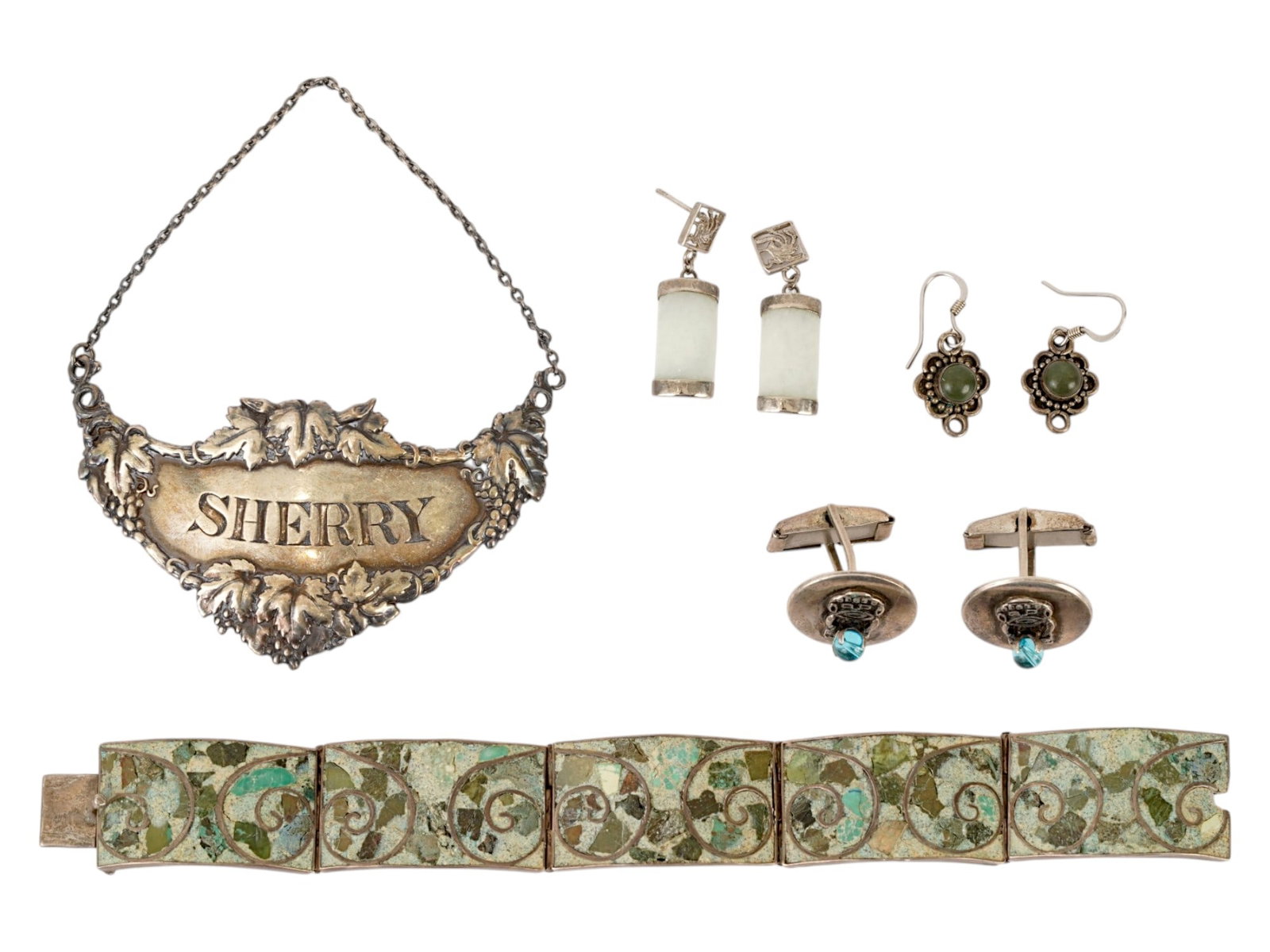 COLLECTION OF STERLING SILVER JEWELRY WARES: A collection of sterling silver items features a wide hinged panel bracelet decorated with inlaid pieces and wires, marked Sterling Mexico on the inner side. An ornate sterling silver Sherry decanter