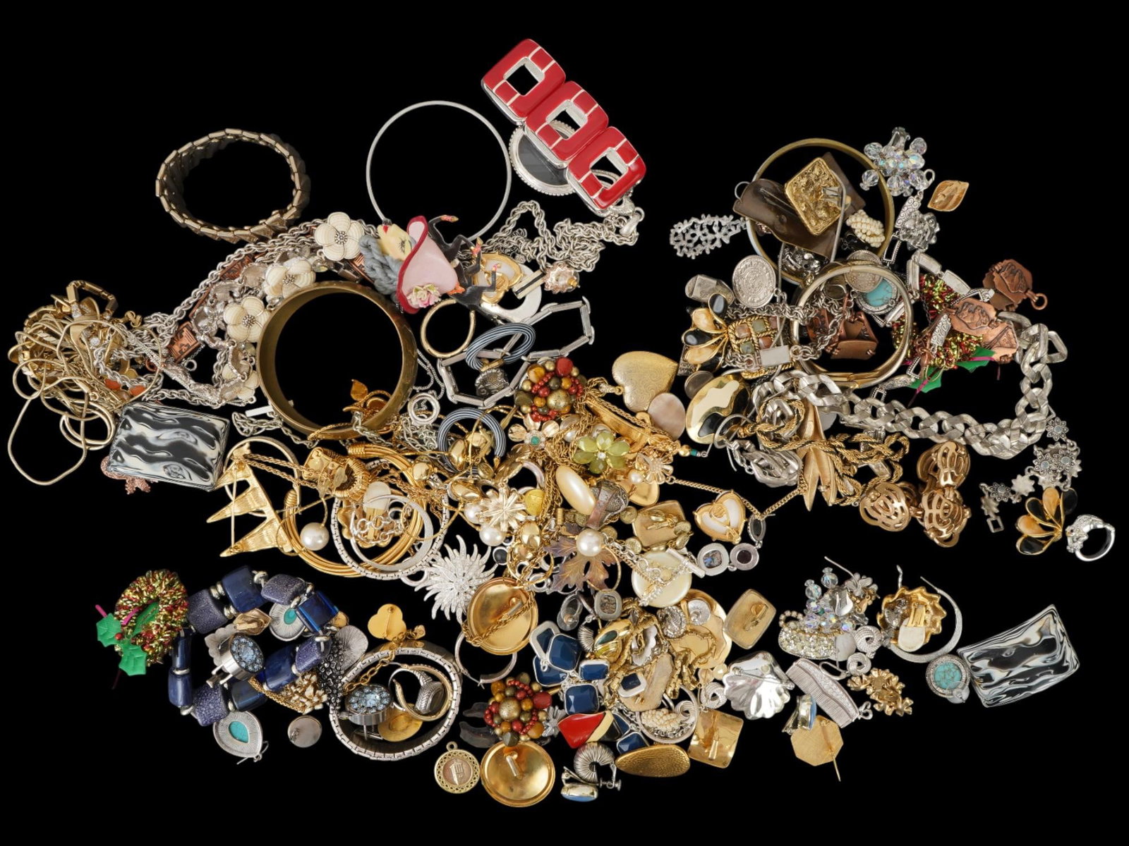 LARGE COLLECTION OF MISCELLANEOUS JEWELRY WARES: A large collection of miscellaneous jewelry wares made of variety of designs and materials. The collection includes bracelets, necklaces, pairs of earrings and more, an assorted mix of vintage and