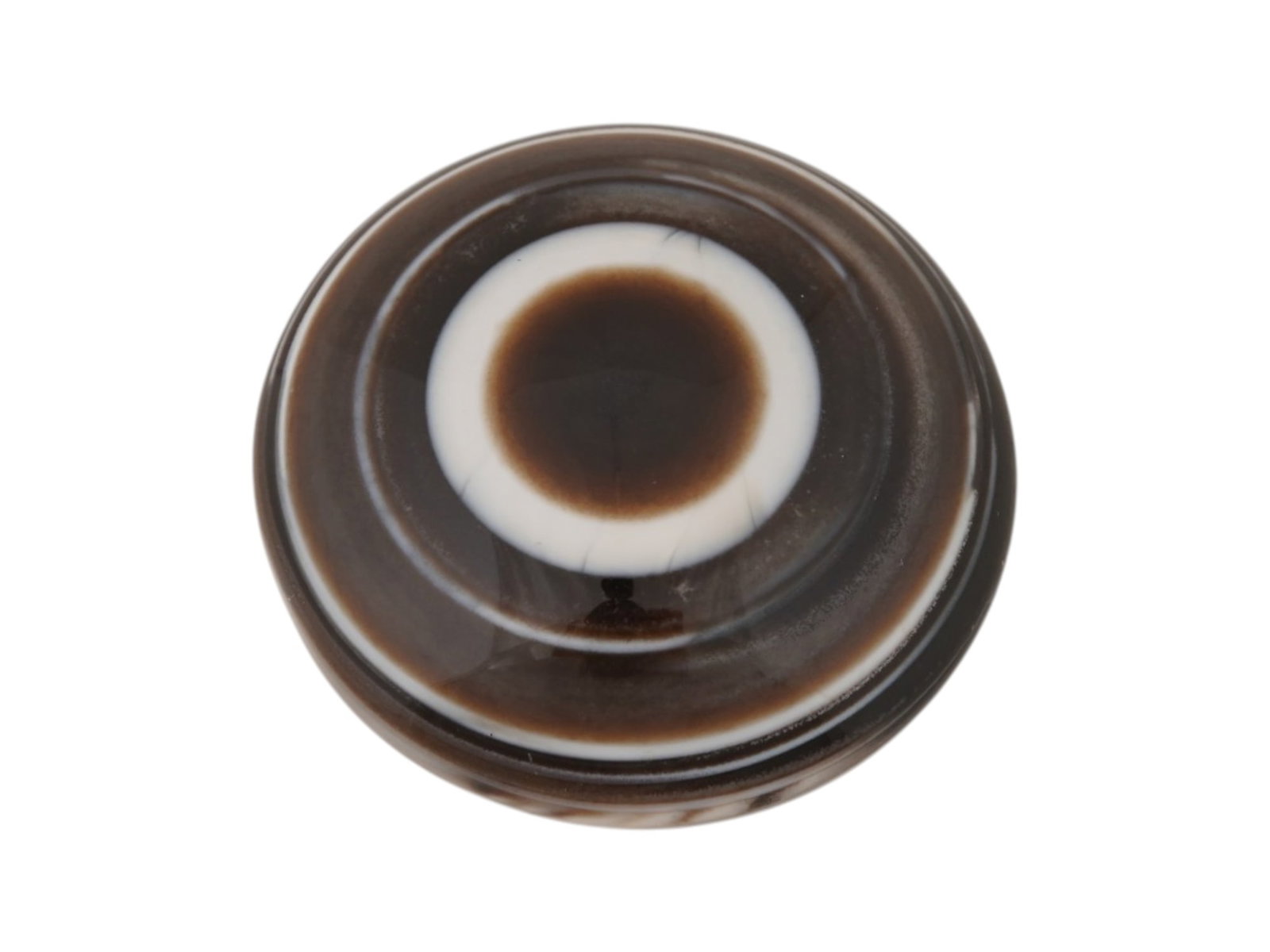 LARGE NATURAL BULLSEYE BANDED AGATE CABOCHON: A large natural bullseye banded agate cabochon. The polished gemstone displays a concentric eye pattern with alternating brown, white, and black bands. Natural Gemstones And Jewelry Collectibles. THIS