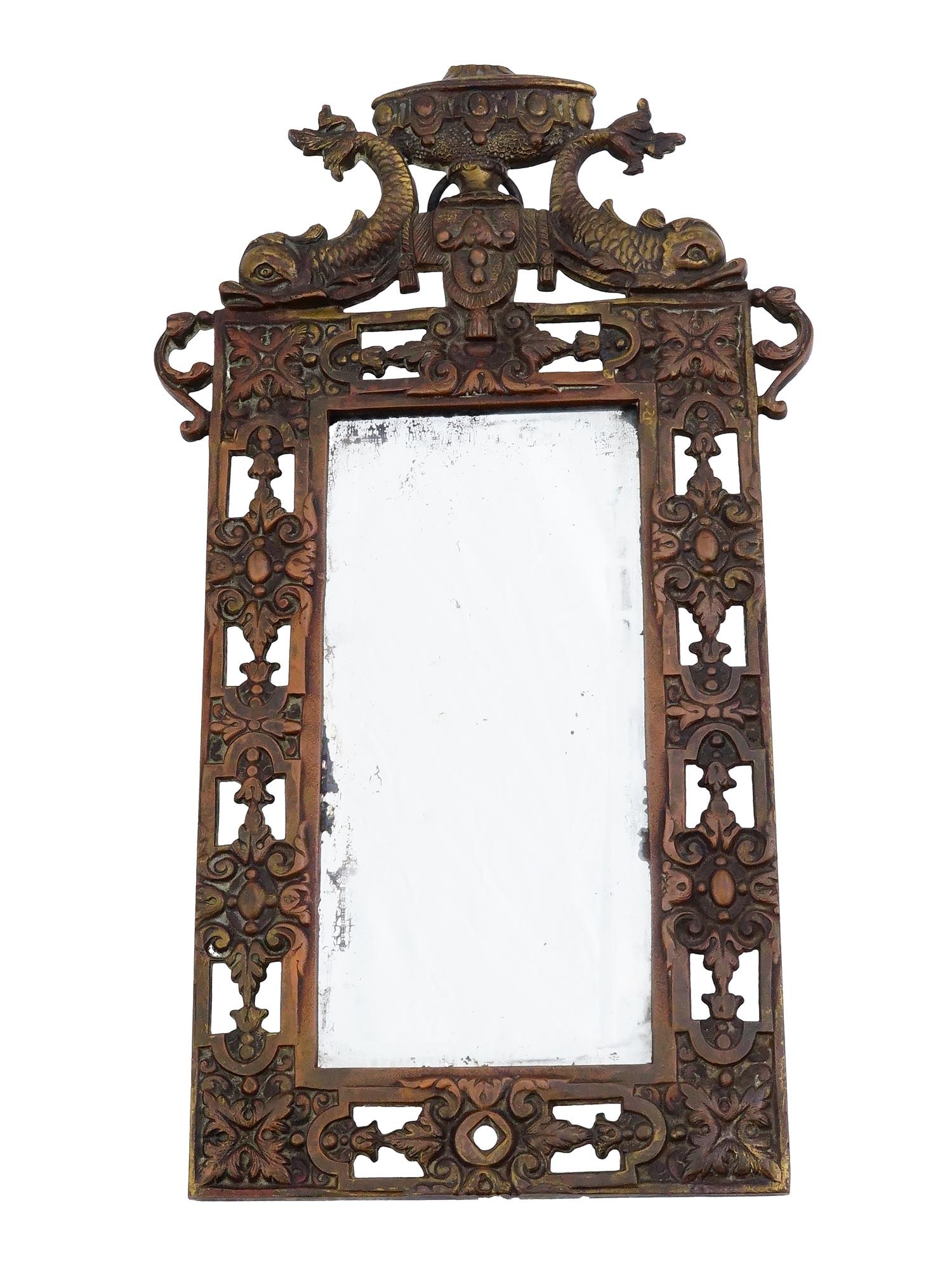 ANTIQUE BRADLEY AND HUBBARD BRONZE VANITY MIRROR: An antique Bradley and Hubbard vanity or wall mirror, dating to the late 19th or early 20th century, featuring a bronze frame with gilt finish showing age-appropriate patina and wear. The frame is ric