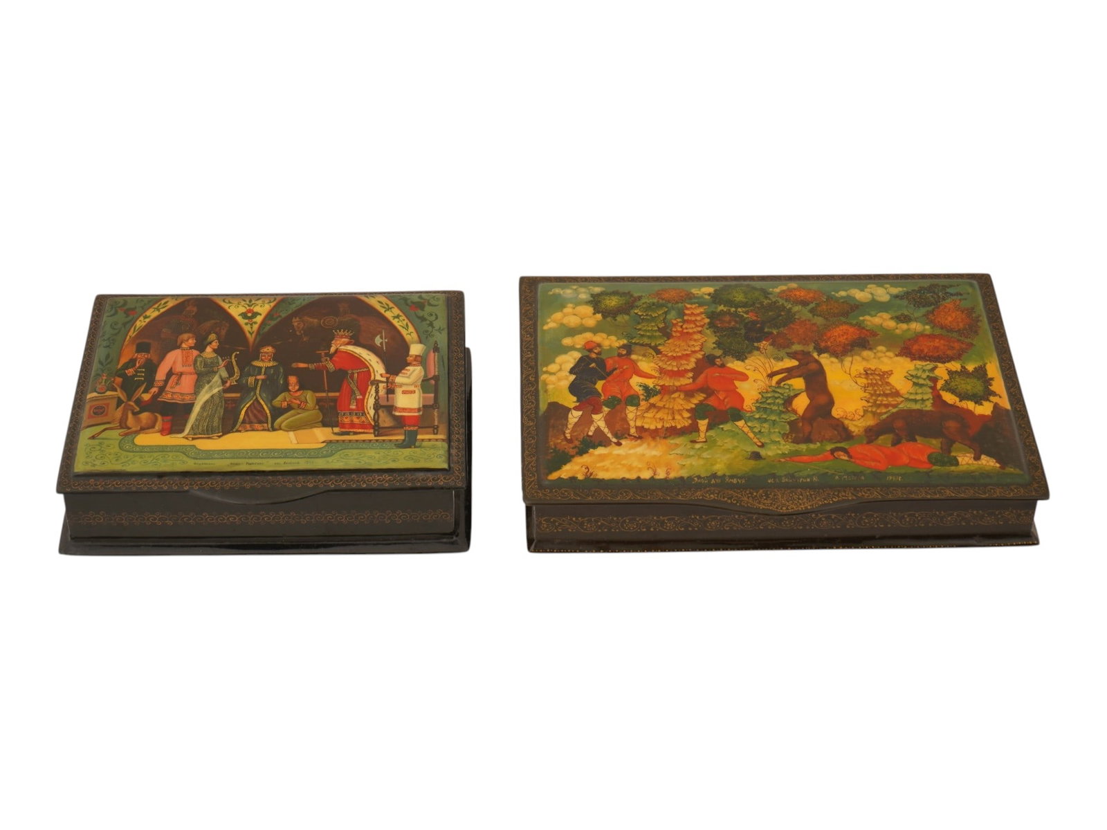 RUSSIAN MSTYORA FEDOSKINO LACQUERED TRINKET BOXES: A lot of two Russian lacquered trinket boxes of rectangular shape. Each piece is hand-painted. First, Konyok-Gorbunok, The Little Humpbacked Horse, signed Aksyonov, 1993, Fedoskino. The second depicts