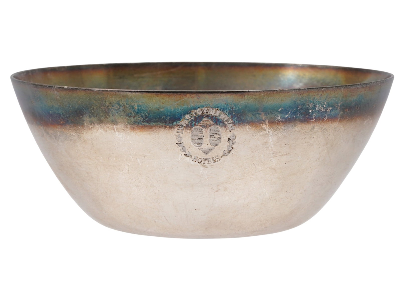 VINTAGE SILVER PLATED BOWL INTERCONTINENTAL HOTELS: A vintage silver-plated bowl. Simple unembellished design, engraved InternContinental Hotels logo in the front. Unmarked. InterContinental Hotels Group, or IHG, is a British multinational hospitality 